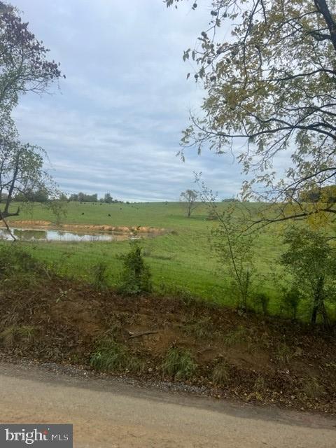 READY TO BUILD LOT minutes to Rt 7 located on Castleman Road. Close to Shenandoah River. Beautiful views of pastures, hills, and pond. Septic area clearly marked to help visualize future homesite. New driveway just completed. Perc, well, and resistivity tests have all been completed. Very unique area.
