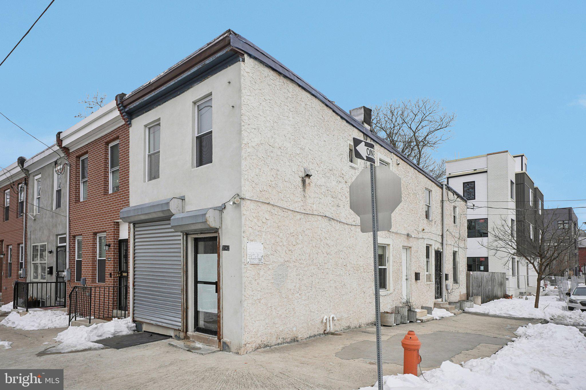 Live in one unit, rent the other and let the property pay for itself.

This corner-unit duplex in booming West Philadelphia last generated $2,400/month in rent, with low annual taxes of just $1,412 making it one of the most compelling house-hack opportunities near Drexel University and the University of Pennsylvania.

First-Floor Unit features a fully updated kitchen with granite countertops and newer appliances, open living and dining area with hardwood floors, a full updated bath, in-unit stackable washer/dryer, and direct access to a large fenced rear yard.

Second-Floor Unit offers two bedrooms, two full baths, a combined living and kitchen area, in-unit laundry, separate utilities, and central air designed for privacy and independent living.

Bonus Flex Space a separate studio with its own entrance, large display window, and roll-up security gate. Room can be opened to the first-floor unit for additional living space, or used as a dedicated home office or creative studio.

Additional features include an unfinished basement accessible via a street-level Bilco door, offering generous storage or future expansion potential.

Surrounded by new construction and active neighborhood development, this well-maintained 1,907 sq ft property was extensively remodeled in 2019 including all major utilities and is move-in ready. Whether you're an owner-occupant looking to offset your mortgage or an investor seeking a turnkey income property, 3942 Wallace St delivers immediate cash flow and long-term upside in one of Philadelphia's fastest-growing corridors.

All appliances included. Schedule your showing today.