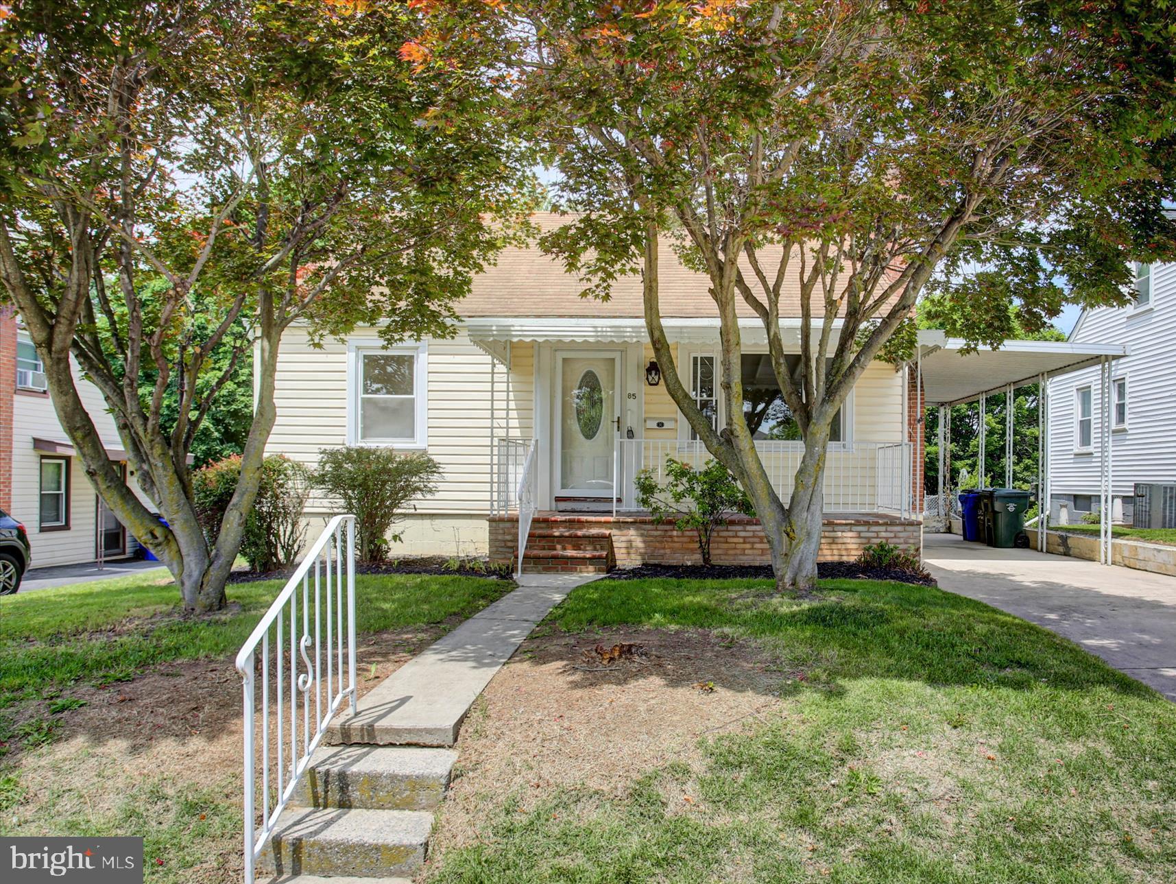 Whether you are looking for a seamless commute or a low-maintenance lifestyle, this beautiful 3-bedroom, 1.5-bath Cape Cod checks every single box. Inside, discover a bright, inviting layout accented by gorgeous hardwood floors that bring timeless warmth to the living spaces. The property boasts excellent indoor-outdoor flow with multiple areas to unwind, including a classic, covered front porch, a spacious back deck, and a concrete patio. The fully fenced backyard offers a private, secure outdoor sanctuary ideal for pets, gardening, or entertaining. This property features a protective carport and ample off-street parking for ultimate convenience. Strategically located just minutes from major commuting routes, this home ensures less time on the road and more time enjoying comfortable, effortless living. Perfectly sized and endlessly versatile, this property is ready for its next owner!