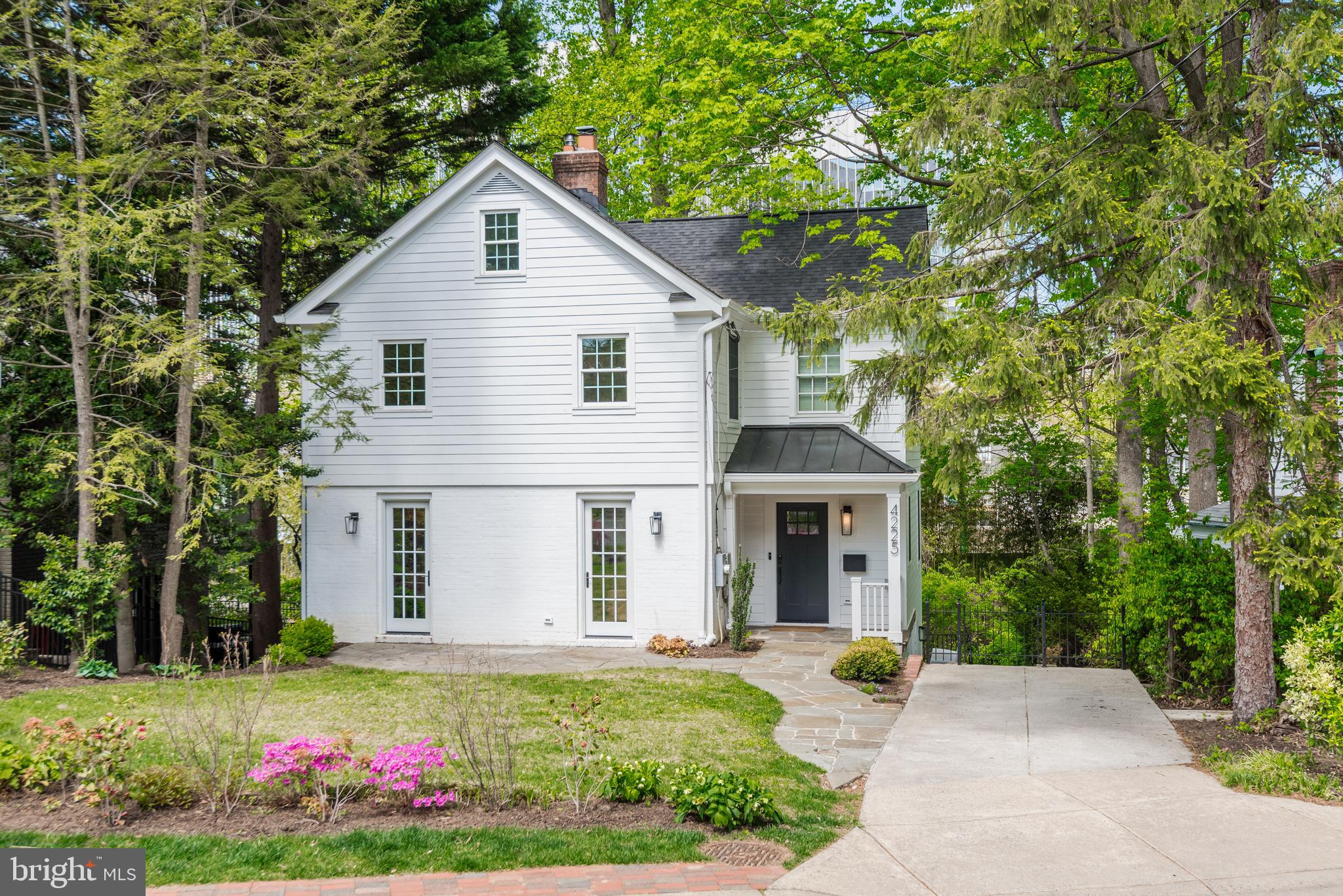 Location, lifestyle, and a significant three-story expansion in the heart of Chevy Chase/Tarrytown—just blocks to downtown Bethesda and Metro.  This thoughtfully expanded home blends original charm with modern functionality. The main level features a sun-drenched, oversized kitchen with premium Miele appliances, peninsula seating, and butler’s pantry, opening to flexible living and entertaining spaces including a dedicated office. A welcoming mudroom with powder room adds everyday convenience. Upstairs, the home offers generous bedrooms, primary with walk-in closet,  and spa-like baths, while the partially finished attic provides additional versatile space for work or play. The walk-out lower level is fully finished with a family room, play area, bedroom, full bath, and kitchenette—ideal for guests, in-laws, or extended living. Additional storage and Laundry Room. Outdoor spaces include a front patio and two-tiered rear decks surrounded by mature greenery, creating a private, treehouse-like setting. Additional features include hardwood floors, wood-burning fireplace, newer roof, EV charger, and off street parking. Expanded, light-filled, and exceptionally located—this is a rare opportunity to own a move-in ready home in one of Bethesda’s most sought-after neighborhoods, just across from the Lawton Community Center, offering tennis, playgrounds, and everyday recreation . Moments to Bethesda Row, Metro, and the Capital Crescent Trail, and Elm Street Park . The Town of Chevy Chase offers unmatched municipal services, a close-knit community feel, and one of the most desirable in-town lifestyles in the DC region—where walkability, charm, and convenience truly converge.