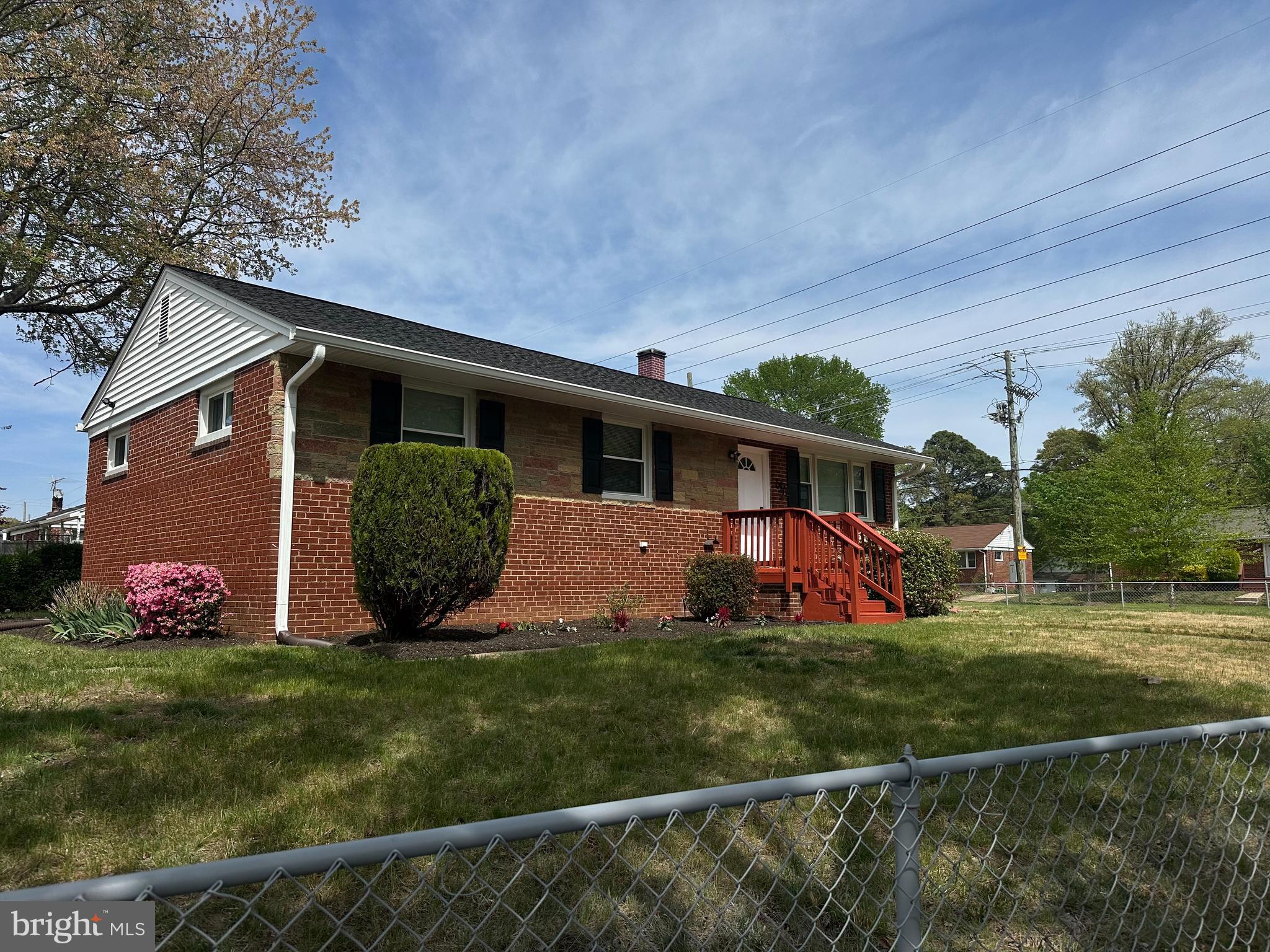 This gorgeous Rambler is a definite MUST SEE!! It has been TOTALLY renovated.  There are 6 Bedrooms and 2 Full Bathrooms.  The Kitchen has new Stainless-Steel appliances; Gorgeous White cabinets and beautiful Counter tops; The Living Room is Open and has pretty Hardwood Floors; Brand New Washer and Dryer are in the Basement; Hardwood floors are also in the upstairs bedrooms. Just off the Kitchen, there's a covered porch perfect for entertaining guests. The yard is fenced in and a new driveway is there for your cars. The Basement level has been totally renovated and is so nicely done. The Roof, Windows, Plumbing, etc. are all brand New. A large Shed in the yard. The house is in a great location near shopping, dining, and transportation.  An AMAZING house just waiting for you.  Call for an appointment. Don't miss this one.