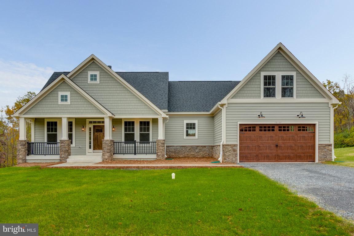 Custom home TO-BE-BUILT. This is a full custom builder so build this model, pick another plan from the plan library and modify to suit, bring your own plan, or design from scratch. With over an acre, this lot is the perfect backdrop for this charming craftsman inspired home. Consisting of walnut hues and thistle greens, The Calvert design respects its stunning surroundings while offering every modern convenience. This 3 (or 4) bedroom, 2.5 bath home commands traditional and strong features with contemporary luxury. Beautifully packaged in this warm and inviting home, you will find hardwood floors, owner’s suite tray ceilings, inviting open floor plan, family room with stone fireplace and breathtaking views. Two bedrooms on the opposite side of the home from the primary suite, offer a lot of privacy. They share a bathroom and there is an additional flex room that could be a, study, playroom, etc. This is one level living at its finest. There is a full basement which can be finished if desired. Two car garage can be front or side entry and a third garage is an easy addition. The lot is beautiful with lots of privacy and views and just minutes from Frederick and even closer to all the shopping and dining in Urbana.