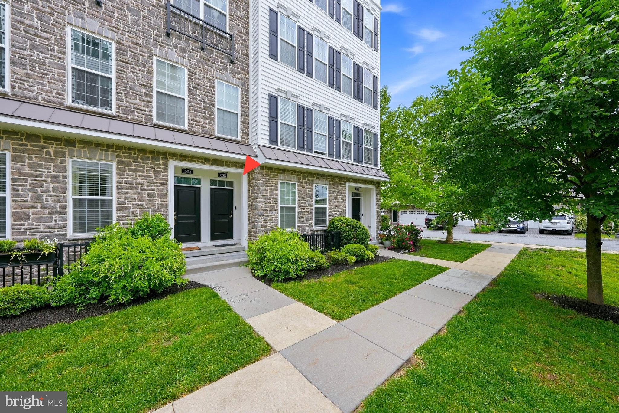Welcome to 103-B Jay Aly nestled in the prestigious Ravenscliff Community. This lovely townhome boasts 3 bedrooms and 2.5 bathrooms, providing ample space for comfortable living and a one car attached garage for added convenience. Upon entering, you are greeted by a dual-level foyer that provides ground level closet space. Up the stairs to the main floor which features rich, dark, hardwood floors and high ceilings. The expansive living and dining area are illuminated by oversized windows which let in wonderful natural light. The living and dining rooms are open to each other and make it easy to entertain guests.  The heart of the home is the gourmet kitchen, which includes a large island with a breakfast bar, stainless steel appliances, soft close doors and granite countertops. The kitchen overlooks the family room space, making it easy to converse with family at meal prep times.  Adjacent to the kitchen is a cozy breakfast area, ideal for casual meals. Step out onto the covered balcony to enjoy your morning coffee or evening refreshments. The second level offers a serene retreat with 3 spacious bedrooms and 2 full baths. The primary suite is a sanctuary, featuring a  custom walk-in closet and a private balcony. The en-suite bathroom is complete with an oversized walk-in shower and a beautifully crafted vanity. The primary also has a private balcony.  Additional conveniences include a second-floor laundry room. The Rooftop Deck is the crowning jewel of this home, offering incredible views and spectacular sunsets, making it perfect for outdoor entertaining. HOA fee includes exterior maintenance, roof, trash, snow removal and landscaping.  Just minutes from the vibrant downtown Media Boro!  Minutes from the airport, shopping, great restaurants and many other amenities.  Convenient to Rt 1, I476 offer a quick commute to Philadelphia.