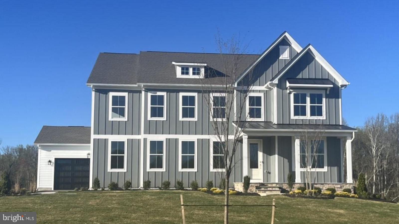 IMMEDIATE MOVE IN AVAILABLE!!!  Country meets luxury living on this sprawling 1.5 acre ultra private homesite, with just over 4,600 sqft above grade, complete with a finished basement, bedroom and full bathroom on main level and 4 car garage. The Hampton features an extensive grand 2-story foyer, formal dining room, tray ceilings, and fireplace. The chef's kitchen includes a double oven, stainless steel appliances and walk-in pantry. Owner's bathroom is to die for.  Walkout basement with 9ft ceilings, includes a finished rec room, hobby room, and full bathroom.  . *Photos not of actual home, and are of a similar model*