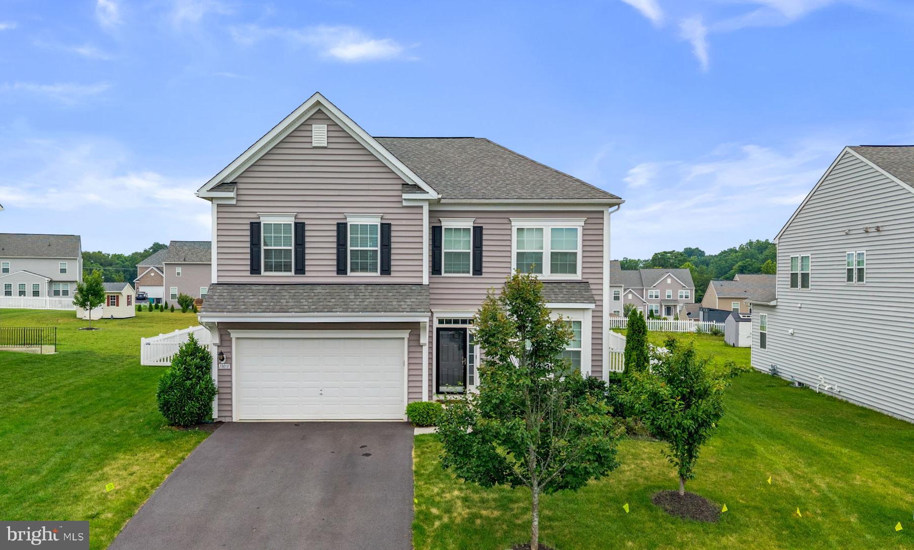 BUY THIS HOME WITH 0% DOWN!! Welcome to this beautifully maintained 4-bedroom, 2.5-bath colonial located in the highly desirable Westfields community of Hagerstown. Built in 2021, this spacious home offers 2,588 finished square feet above grade plus an unfinished basement ready for your personal touch and future expansion.

The main level features an open-concept layout with luxury vinyl plank flooring, a bright family room, and a gourmet kitchen complete with granite countertops, a center island, stainless steel appliances, and abundant cabinet space. A functional mudroom with built-in storage provides everyday convenience.

Upstairs, you'll find generously sized bedrooms, including a spacious owner's suite with a walk-in closet and private bath. The unfinished lower level offers over 1,000 square feet of additional space with endless possibilities for a future recreation room, home gym, office, or guest suite and a pre-installed bathroom rough-in for easy future finishing. 

Situated on a premium 0.36-acre lot, the fully fenced backyard provides plenty of room for entertaining, play, and pets. Enjoy outdoor gatherings on the large concrete patio while taking in the expansive yard. Additional highlights include a 2-car garage, attractive curb appeal, professional landscaping, and modern finishes throughout.

Conveniently located near I-70, shopping, dining, parks, and schools, this move-in-ready home combines the benefits of newer construction with outdoor space that is increasingly difficult to find.