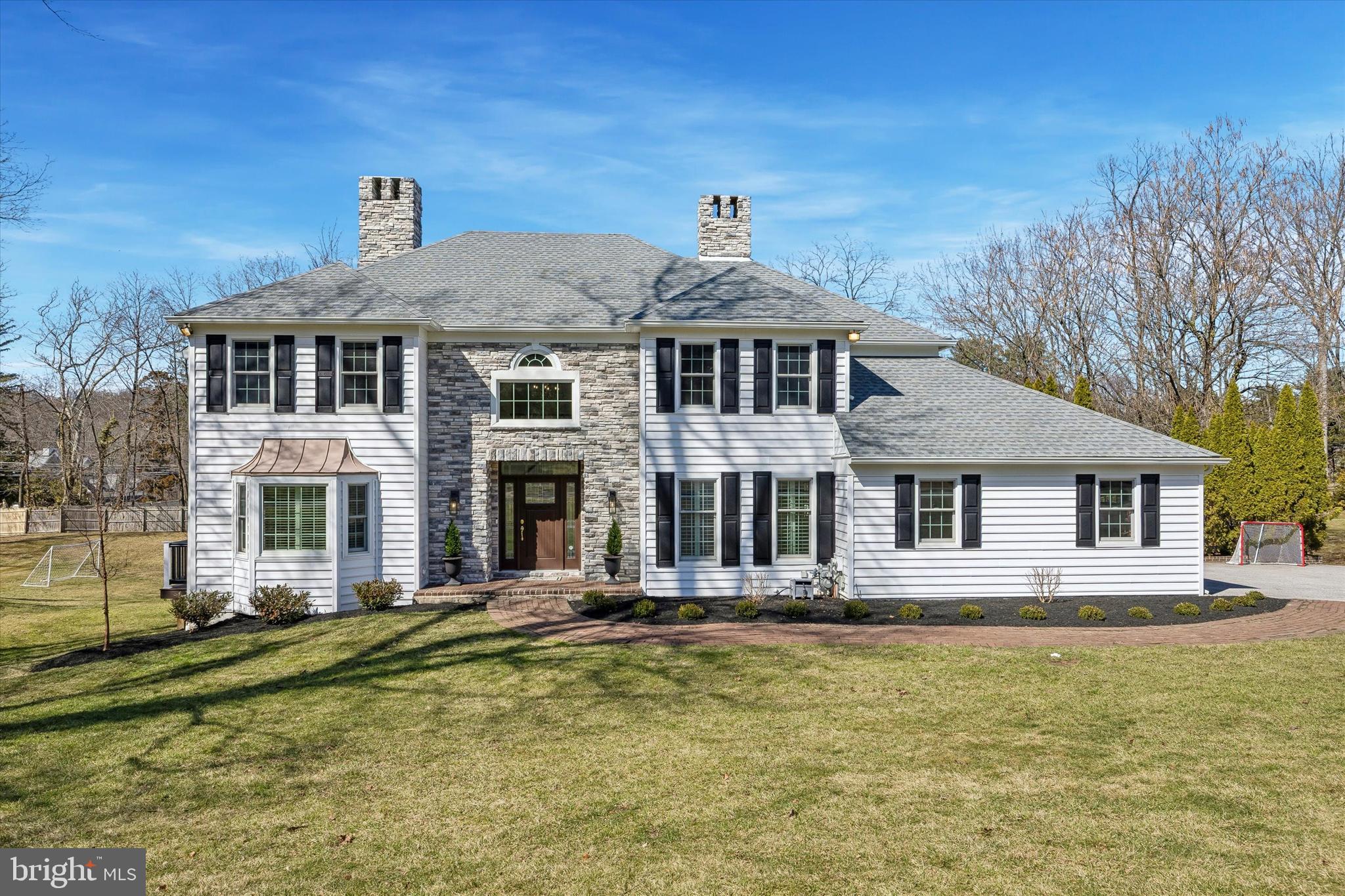 Exquisitely Renovated 4BR | 4.5BA Residence on a Premier Bryn Mawr Street 
Situated on one of Bryn Mawr’s most prestigious streets, this impeccably upgraded 4-bedroom, 4.5-bath home blends timeless architecture with high-end modern enhancements throughout. A complete exterior transformation featuring new windows, ProVia siding, and elegant stonework creates striking curb appeal and enduring quality. The gourmet kitchen serves as the heart of the home, appointed with high-end stainless steel appliances, generous cabinetry, and a bright eat-in area. Just beyond, a versatile adjoining space currently used as a playroom and homework area offers the perfect family hub — easily adaptable as a study, sitting room, or additional office. A formal dining room provides an elegant setting for entertaining, while a first-floor living room offers additional flexible space for relaxation, reading, or gatherings. An inviting den, with gas fireplace is perfect for casual family living. Coming in from the attached 2-car garage, custom cubbies provide organized storage for coats, shoes, backpacks, and everyday essentials, keeping the home clutter-free and functional. The newly installed second floor hardwood flooring, updated carpets, refined trim, and abundant storage reflect thoughtful attention to detail at every turn. Upstairs, the generously sized primary suite is a true sanctuary, featuring an expansive walk-in closet and a beautifully renovated, spa-inspired bath. In addition to the primary suite, three large secondary bedrooms all feature outfitted closets, offering ample storage and organization for family living. Two additional full bathrooms , one is a newly added en-suite , and the other  located in the hallway and has been fully renovated, enhancing comfort and convenience. The fully finished lower level includes a brand-new full bath, creating flexible space ideal for guests, recreation, fitness, or media.
Extensively upgraded and move-in ready, this exceptional residence offers turnkey luxury in one of the Main Line’s most coveted locations, with convenient access to highways, trains, universities and center city Philadelphia.