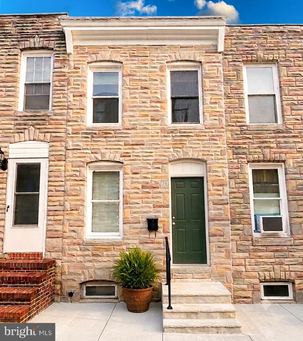 Classic Federal-style brick rowhome has been thoughtfully refreshed and is ready for you to move right in.
Key Highlights:
Fresh & Modern: The entire home boasts fresh interior paint and brand-new Luxury Vinyl Plank (LVP) flooring throughout, offering a seamless, durable, and stylish aesthetic.
Sun-Drenched Living: Large windows flood the home with natural light.
Versatile Layout: Features 2 bedrooms plus a flexible second-floor den—perfect for a home office, nursery, or creative studio.
Recent Upgrades: Peace of mind comes standard with a new roof (2024) and a brand-new front-loading dryer (2024).
Bonus Space: A full, unfinished basement provides ample storage and includes an additional unfinished bathroom with great value-add potential.
Outdoor Living: Step out the back utility door to your private backyard, ideal for pets, urban gardening, or summer grilling.
This is a gem for first-time buyers looking for a turn-key home in a premier location or a great rental investment.  
Schedule your tour today and see this Federal Hill beauty for yourself! Sold As-Is.
Pictures has been enhanced by virtual staging