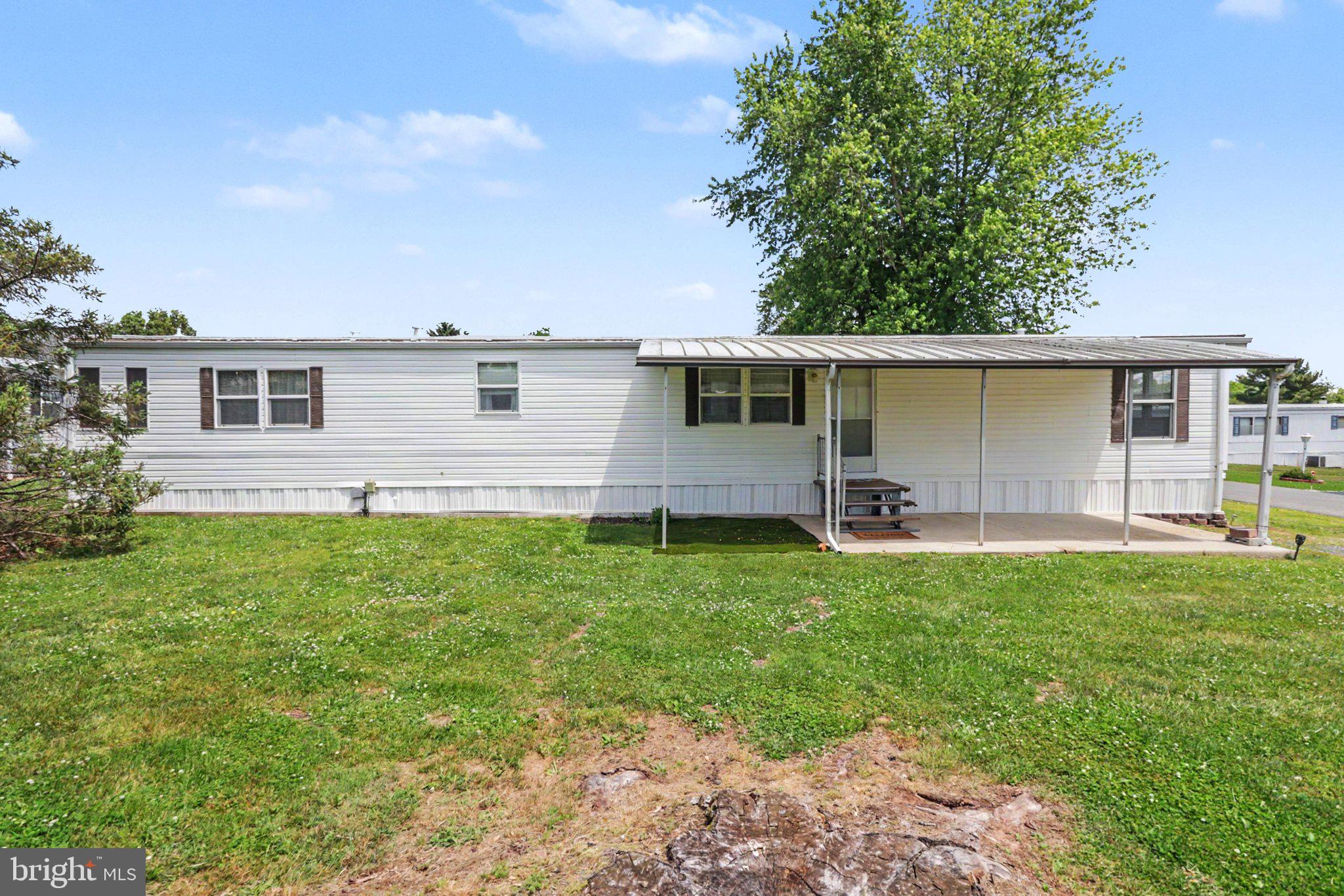 Enjoy the ease and convenience of one-level-living in this 3 bedroom home in the 55+ community of Cavalry Heights Mobile Home Park. The home features a spacious living room, an eat-in kitchen with built-ins, a private owner's suite with an ensuite bathroom, and two additional bedrooms and a full bathroom. The monthly lot rent includes water, sewer, trash, and snow removal. Park approval is required and all occupants must be approved and meet the 55-years-of-age-or-older requirement. Centrally located close to Gettysburg, Hanover, shops, dining, and Routes 15 and 116. Schedule your private tour today!