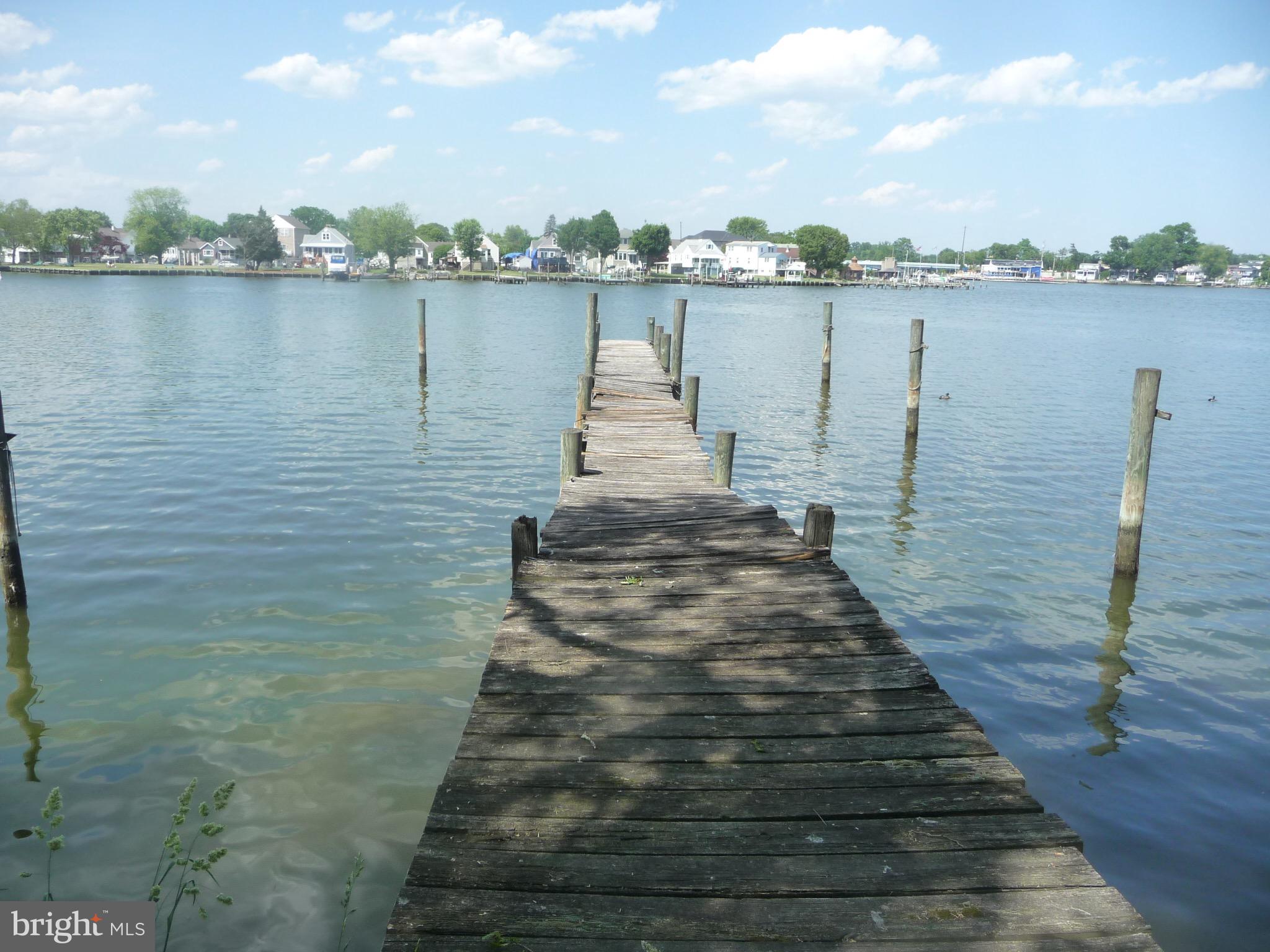 Rarely Available Dundalk Waterfront Rancher with a Private Dock in need of rehab with almost 2500 sq ft of living area with 4 BR's and 2 baths. on .22 acres.  Schedule your showing today!