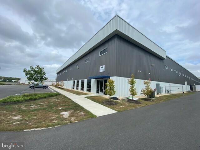 SALE OR LEASE!  Single-tenant NNN industrial investment property in Cambridge, MD constructed in 2022. The building was fit-out specifically for food grade.  Current tenant is two years into their term. The current rent is $644,700 plus NNN with 3% annual increases.  The building is 70,000 sq.ft. on 4.39 acres with a shared common entrance and common area parking in addition to the private parking.

The tenant is Bay Valley Foods - a division of Tree House Foods - the #1 pickle & pepper supplier in the US will not be renewing their lease.   The property is now available for lease or sale as an investment or vacant for an user.  The Landlord and Tenant maintain a positive working relationship, allowing flexibility for a sublease through January 2028 or a long term term arrangement.   With over 2 years remaining on the existing lease, there is flexibility with the options for this property.  

27' clear height throughout the warehouse offering excellent flexiblity for racking,stacking or high-bay operations.  Top tier electrical infrastructure to support high-power manufacturing operations.  Food-grade ready - super clean, immaculate condition and professionally maintained.   
Industrial satefy features include yellow guard rails around the interior perimeter.  4 electric forklift docking/charging stations.  
Efficient, modern LED lighting throughout designed for bright, high visibility operations.  3 Drive-in doors 14 x 12 and 5 docks 9 x 8.  
Professional 2,500 sq.ft. office with kitchen, conference room, private offices and separate office in the warehouse with lounge and restroom for drivers.  
Asking lease rate is $9.75 per sq.ft. NNN
