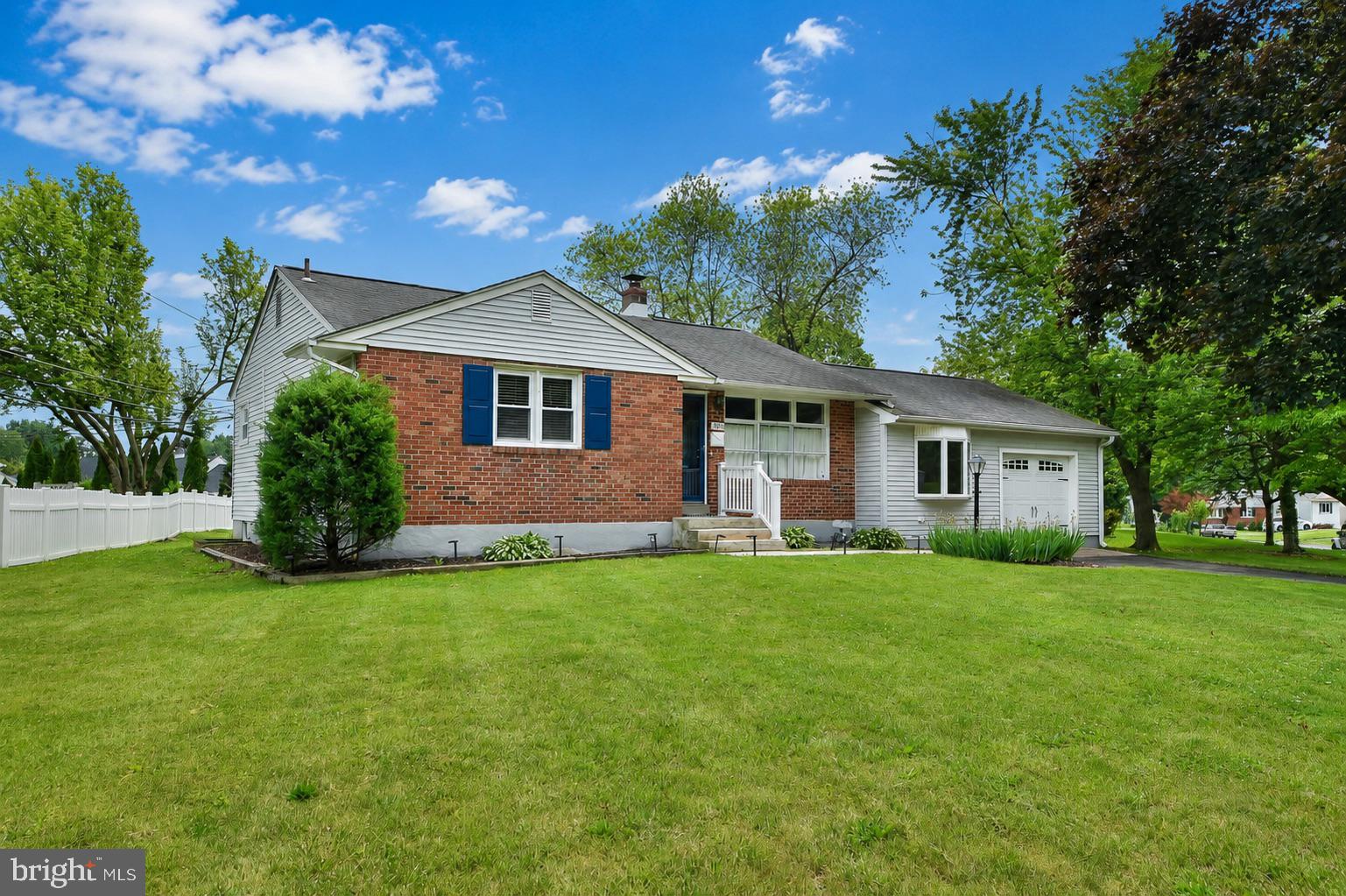 Welcome to this beautifully updated ranch home in the highly desirable Upper Moreland School District. Offering 4 bedrooms and 2 full bathrooms, this move-in ready property combines modern updates, functional living space, and exceptional indoor-outdoor entertaining areas. Upon entering, you’ll be welcomed by beautiful hardwood flooring in the living room, complemented by stylish board and batten accent walls that add warmth and character. The updated kitchen features stainless steel appliances, abundant cabinetry, ample storage, and luxury finishes, creating an attractive and functional space for everyday living. Both full bathrooms have been thoughtfully renovated and feature elegant marble finishes, quality materials, and modern design. The spacious rear family room serves as the heart of the home, showcasing vaulted ceilings, a wood-burning stove, and direct access to the backyard patio. A versatile bonus room provides additional flexible living space and features direct access to both the attached one-car garage and the rear patio, making it ideal for a mudroom, home office, playroom, fitness area, or additional sitting room. The home also offers a first-floor laundry hookup in the bonus room, along with a second laundry hookup in the basement for added convenience. Step outside to enjoy the stamped concrete patio, complete with a modern open pergola—an ideal setting for outdoor dining, entertaining, or relaxing. The home also benefits from a newer hot water heater and a heating and cooling system that has been routinely maintained, providing added confidence in the home’s ongoing care and upkeep. Conveniently located near parks, shopping, dining, major commuter routes, and public transportation, this home offers a wonderful blend of comfort, style, and convenience.