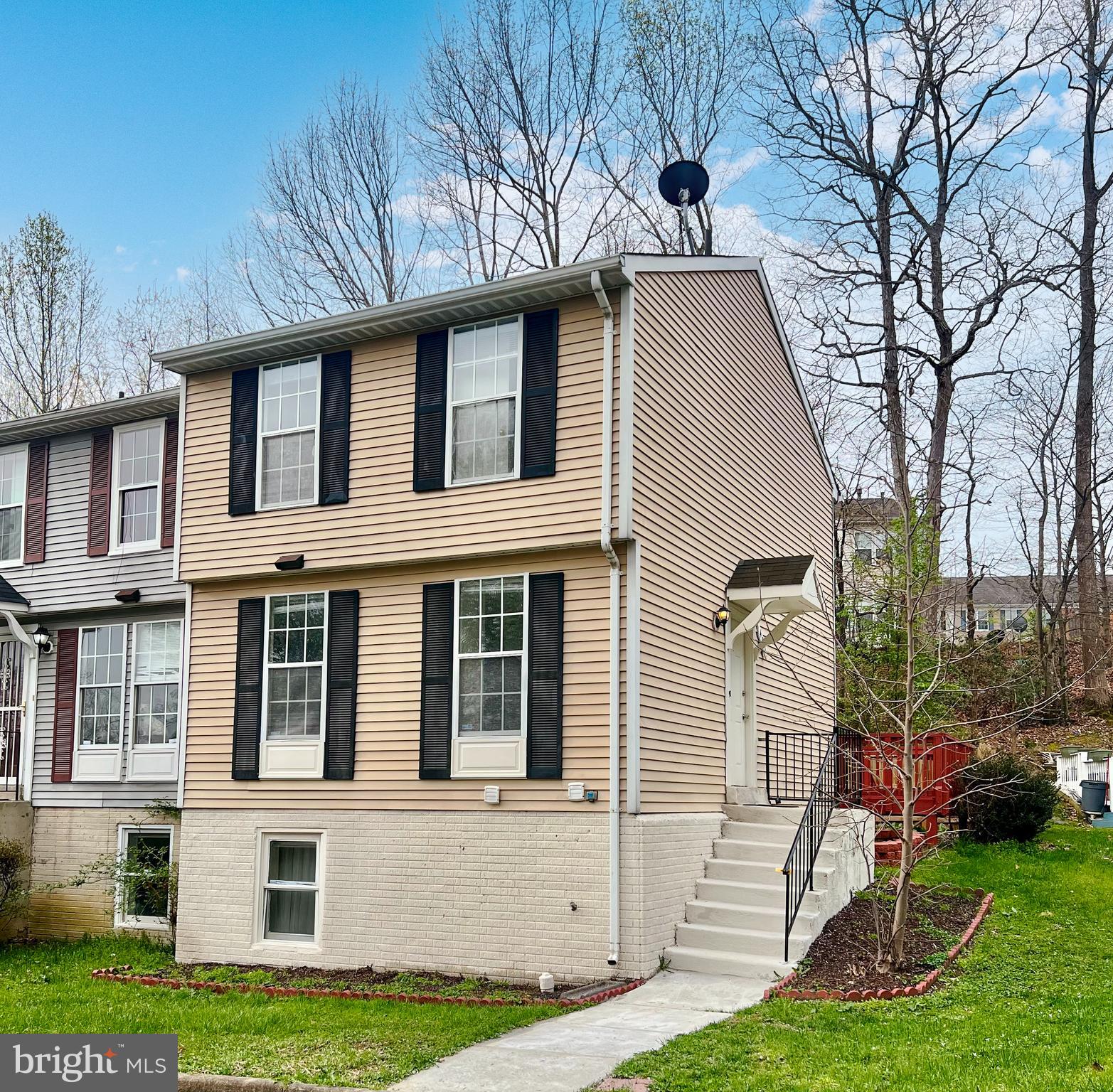 Welcome to this stunning end-unit, 3-level townhouse offering the perfect blend of space, convenience, and comfort! FRESHLY Painted throughout, NEW kitchen countertops, NEW flooring on main level and basement, NEW bathroom vanities, UPGRADED Lighting throughout the house, FRESHLY stained and reinforced deck, NEWER water heater this home is MOVE IN READY!  Featuring 2 spacious bedrooms upstairs with a full bath and a 3rd (not to code) bedroom downstairs with an additional full bath not to mention the powder room on the main level you'll be sure to love the layout.  The lower level includes a kitchenette, providing added flexibility for guests, in-laws, or a home office setup.  The large deck is perfect for entertaining or relaxing outdoors.  Fully fenced in private yard! Enjoy the ease of 2 assigned parking spaces and a super low monthly condo fee. Conveniently located near I-95 and Route 1, this property offers quick access to shopping, dining, and commuting routes.  Don’t miss out on this rare end-unit gem — schedule your tour today.