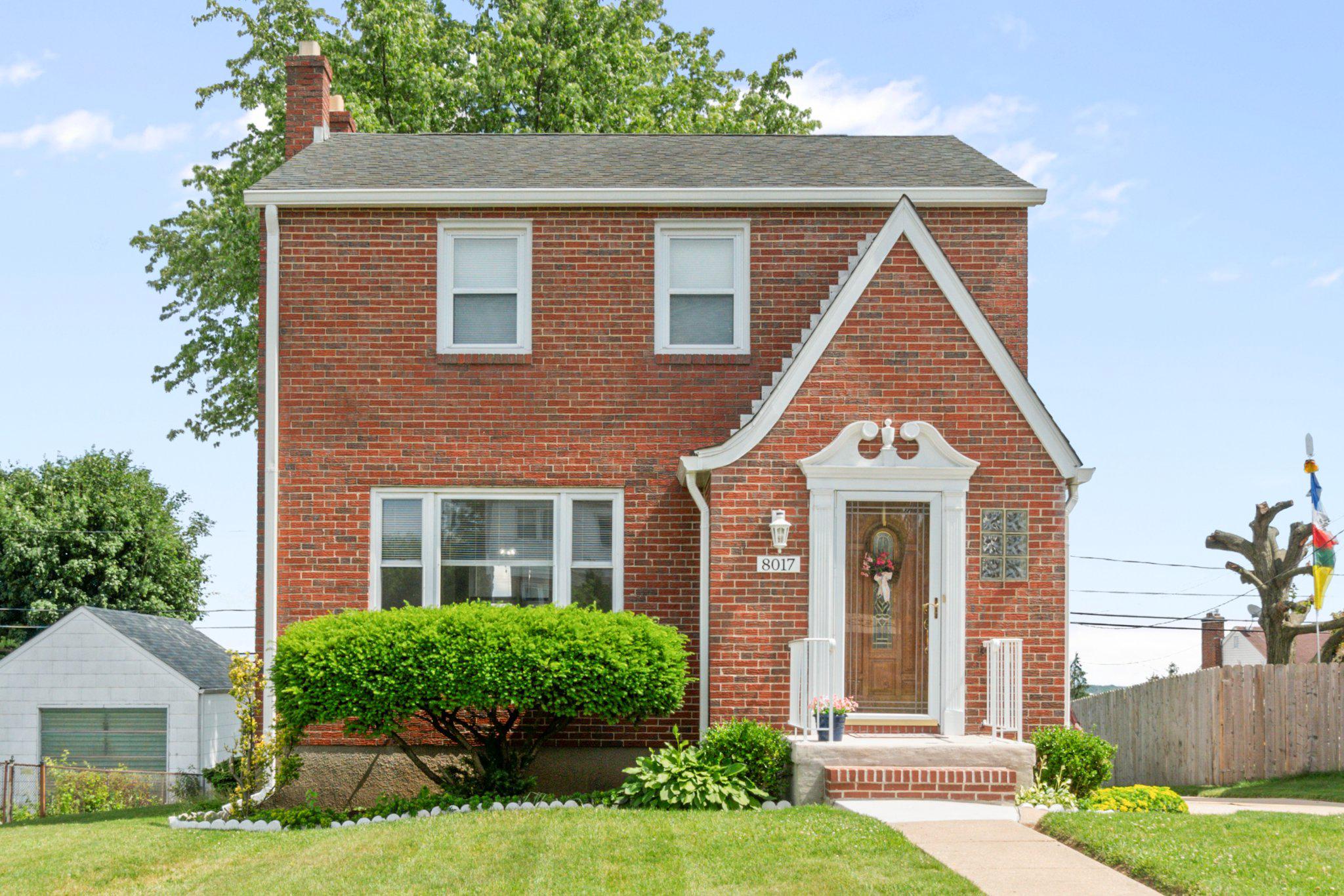 Welcome to this classic all-brick Colonial offering timeless character, solid construction, and a fantastic opportunity to make it your own. Fresh neutral paint throughout and featuring recently refinished gleaming hardwood floors, this well-maintained home is move-in ready and full of potential.

Step inside the welcoming foyer with slate flooring and a convenient coat closet. The bright and inviting family room is filled with natural light from a large picture window and showcases beautiful hardwood floors that continue seamlessly into the formal dining room, creating a warm and functional layout for everyday living and entertaining.

The kitchen offers gas cooking, a built-in microwave, side-by-side refrigerator, tile backsplash, and ample cabinet space. Upstairs, you'll find three generously sized bedrooms, all featuring refinished hardwood flooring, along with a full bathroom accented by ceramic tile finishes.

The finished lower level provides valuable additional living space with a spacious recreation room featuring new durable LVP flooring, a wood stove that conveys as-is, a convenient half bath, and a dedicated laundry area complete with a utility sink.

Outside, enjoy the benefits of an architectural shingle roof, a private storage shed, and desirable off-street parking for 3–4 vehicles. Conveniently located near shopping, dining, parks, schools, and major commuter routes, this charming home offers the perfect combination of comfort, character, and value. **ESTATE SALE - BEING CONVEYED AS-IS**