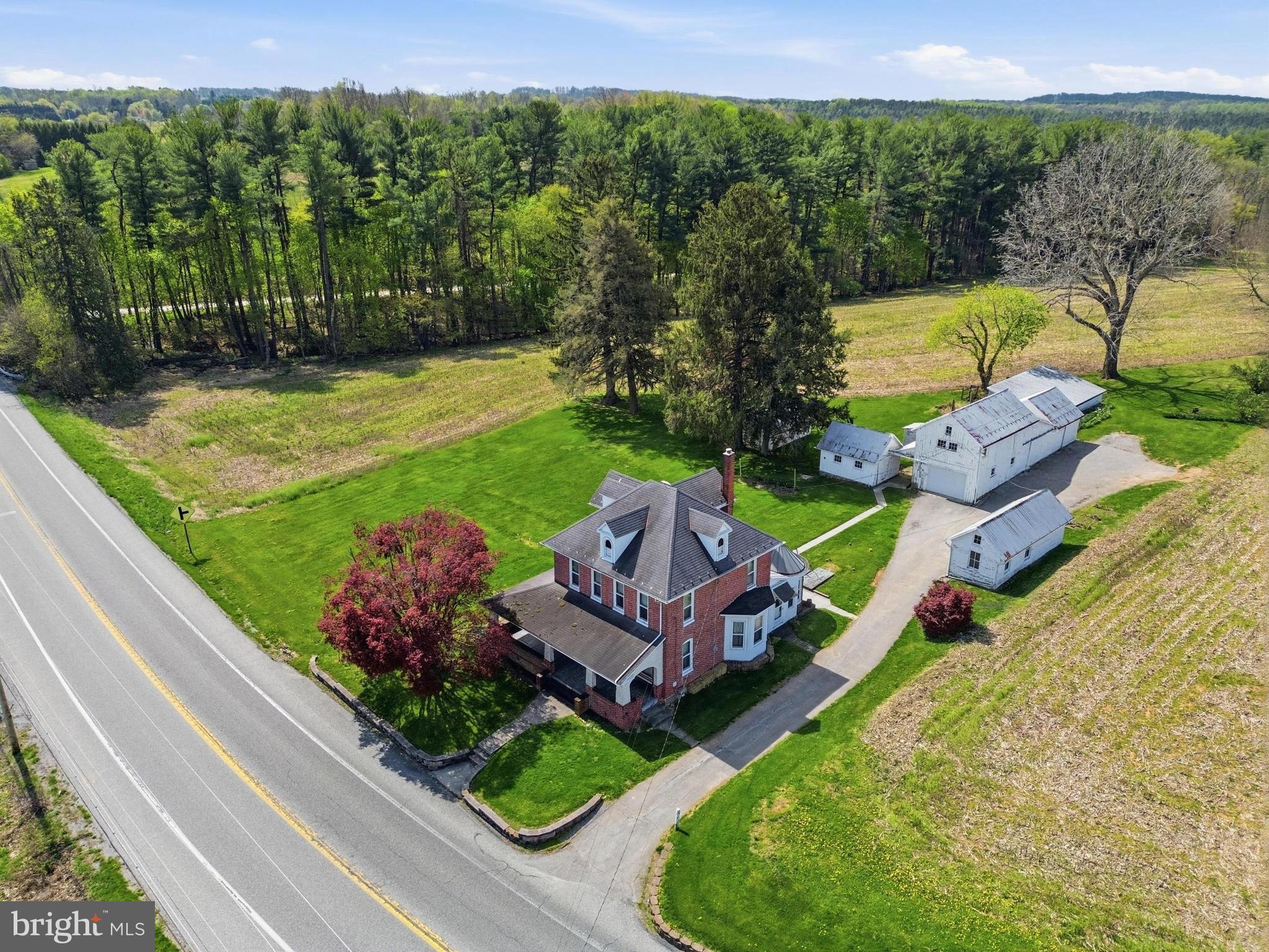 COMMERCIAL ZONING! 4 bed, 2 bath farmhouse with 3 acres active in south Hanover! This property has big potential as it can be used for residential use or can be used as a commercial property for your business with the commercial/industrial zoning! There are a variety of outbuildings and barns on this parcel, with a few of them being used as garage space for the current owners. This could be an excellent location for a commercial property with high traffic volume passing daily. It is also great for someone who wants some space around them and enjoys older farmhouse architecture, quality, and/or homesteading.