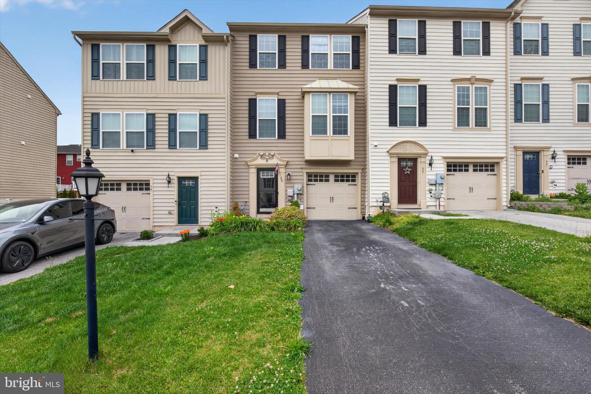 Welcome to 37 S. Center Street in Hanover! This well-maintained 3-bedroom, 2.5-bath townhome offers a spacious and functional layout with multiple levels of comfortable living space.
The main level features an inviting living area that flows into the kitchen and dining space, with direct access to a rear deck—perfect for morning coffee, outdoor dining, or relaxing after a long day. Upstairs, you'll find three bedrooms, including a spacious primary suite with its own private bath, along with an additional full bathroom to serve the remaining bedrooms.
The finished lower level provides valuable additional living space that can be used as a family room, home office, gym, or recreation area. A sliding glass door leads directly to the patio below the deck, creating a great outdoor entertaining space and easy access to the backyard.
Additional highlights include a one-car garage, private driveway parking, and a convenient location close to shopping, dining, schools, and commuter routes.