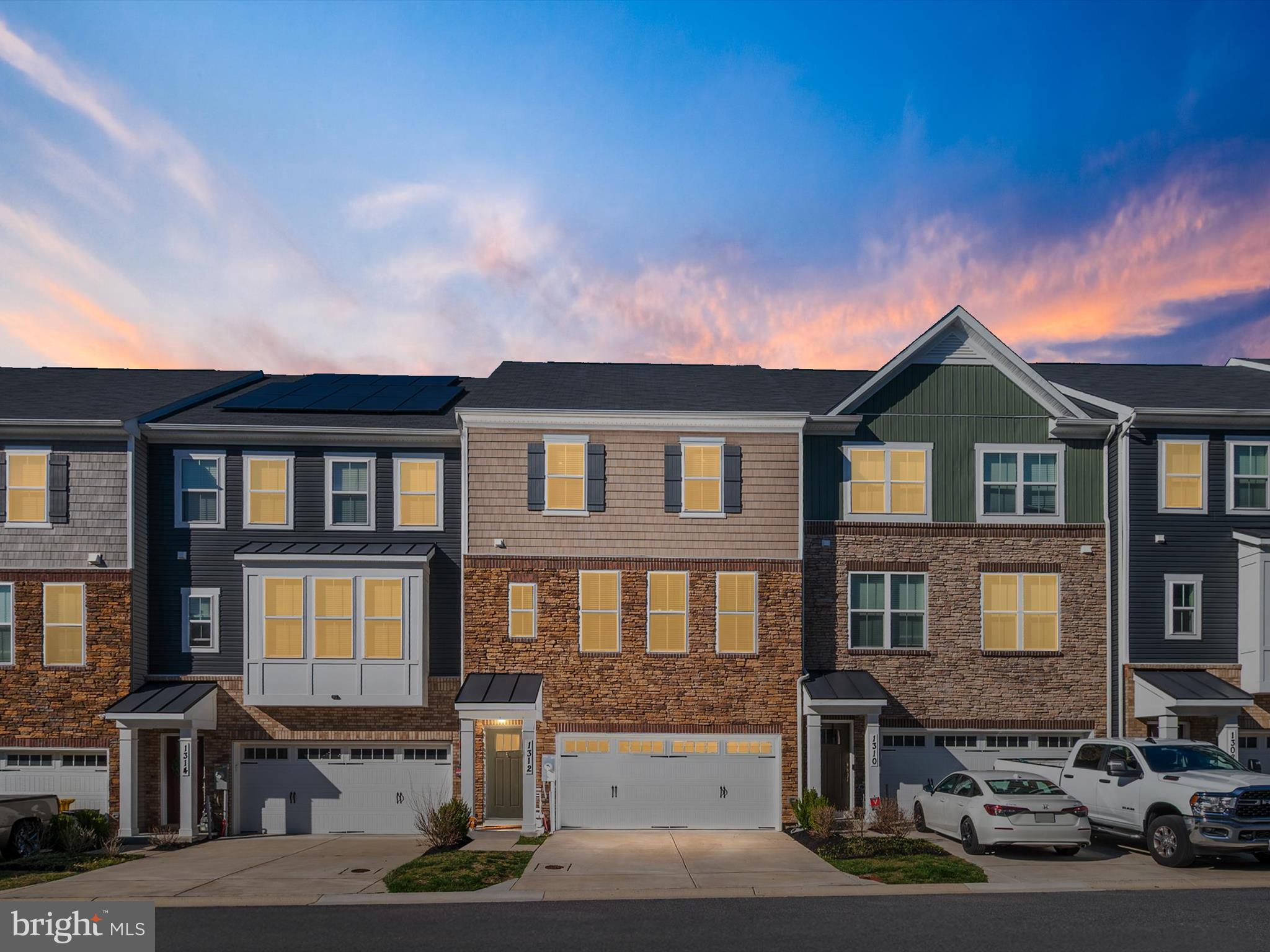 Welcome to this beautifully maintained 3-bedroom, 2 full/2 half bath townhome, just 5 years young and perfectly situated for effortless commuting to DC, Fort Meade, or Baltimore via nearby access to Routes 97 and 50.

Step inside to a welcoming entryway that offers a convenient landing zone, with access to the finished lower-level living space—perfect for a home office, gym, or second family room—complete with a half bath and direct entry to the spacious 2-car garage.

Upstairs, enjoy an open-concept main level designed for modern living. The stylish kitchen features ample counter space and flows seamlessly into the breakfast nook, dining area, and expansive family room—ideal for entertaining or everyday living. A conveniently located half bath adds extra ease.

On the upper level, you'll find a spacious primary suite with a large walk-in closet, generous en suite bathroom with dual vanities, and bonus space within the bedroom perfect for a sitting area or home office. Two additional bedrooms, a full bath, and a well-placed laundry room complete the top floor.

This home offers the perfect blend of style, functionality, and location—don’t miss your chance to call it yours!