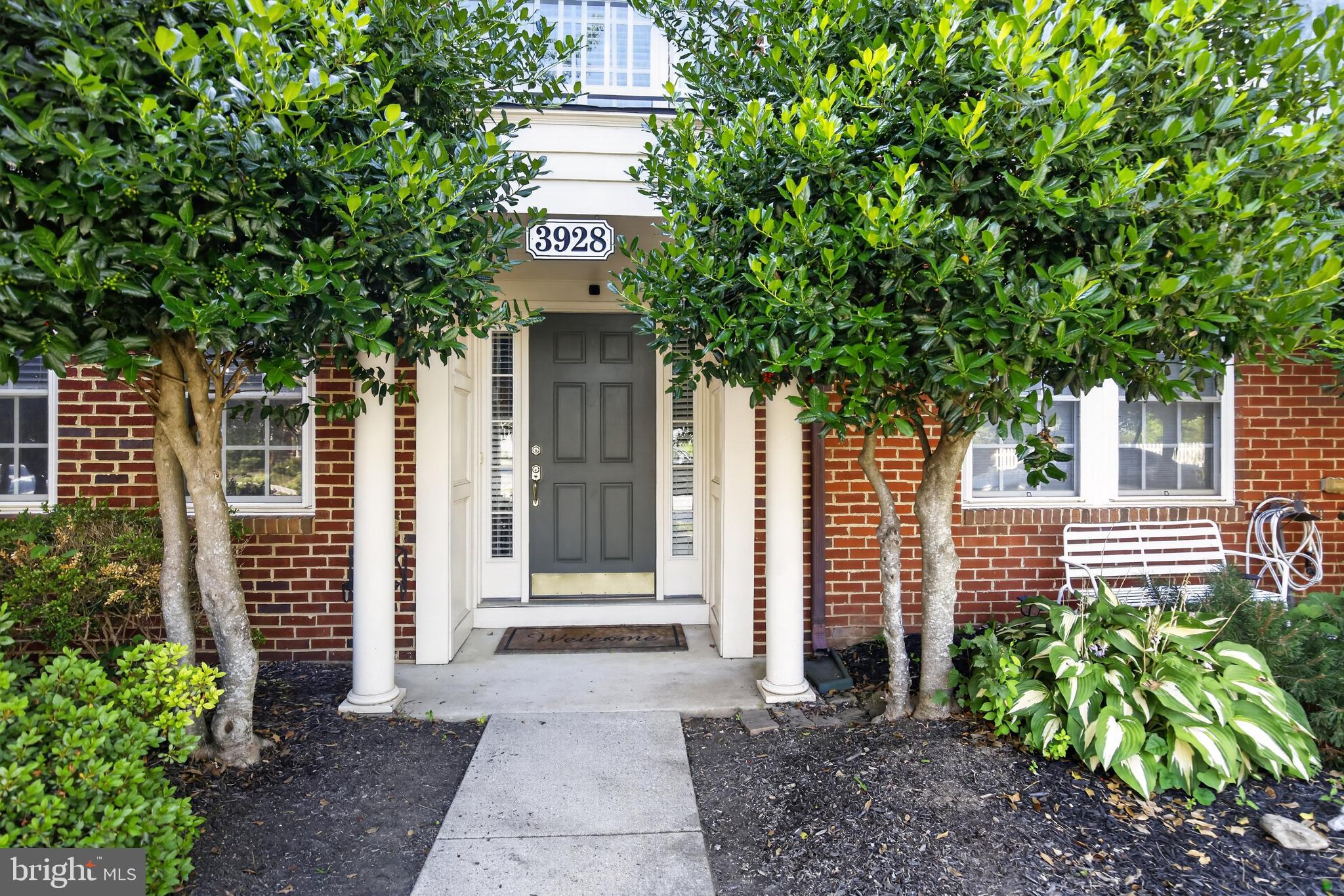 Nestled in the charming Villages of Urbana, this exquisite townhouse offers a perfect blend of luxury and comfort. Spanning 2,748 square feet, this traditional brick home features four spacious bedrooms and three and a half elegantly appointed bathrooms, ensuring ample space for relaxation and privacy. Step inside to discover an inviting open floor plan that seamlessly connects the family room to the gourmet kitchen, ideal for both entertaining and everyday living. The kitchen boasts upgraded countertops, a generous island, and high-end stainless steel appliances, including a double oven and built-in microwave, making culinary adventures a delight. Enjoy cozy evenings by the fireplace in the family room, enhanced by crown moldings and ceiling fans that add a touch of sophistication. Retreat to the master suite, complete with a luxurious soaking tub and walk-in closet, providing a serene escape at the end of the day. Outside, the property features a lovely deck and patio, perfect for al fresco dining or morning coffee. With a detached two-car garage and community amenities, including a pool, this home embodies an exclusive lifestyle that balances leisure and convenience. Experience the warmth and elegance of this remarkable residence, where every detail has been thoughtfully curated for your enjoyment.
