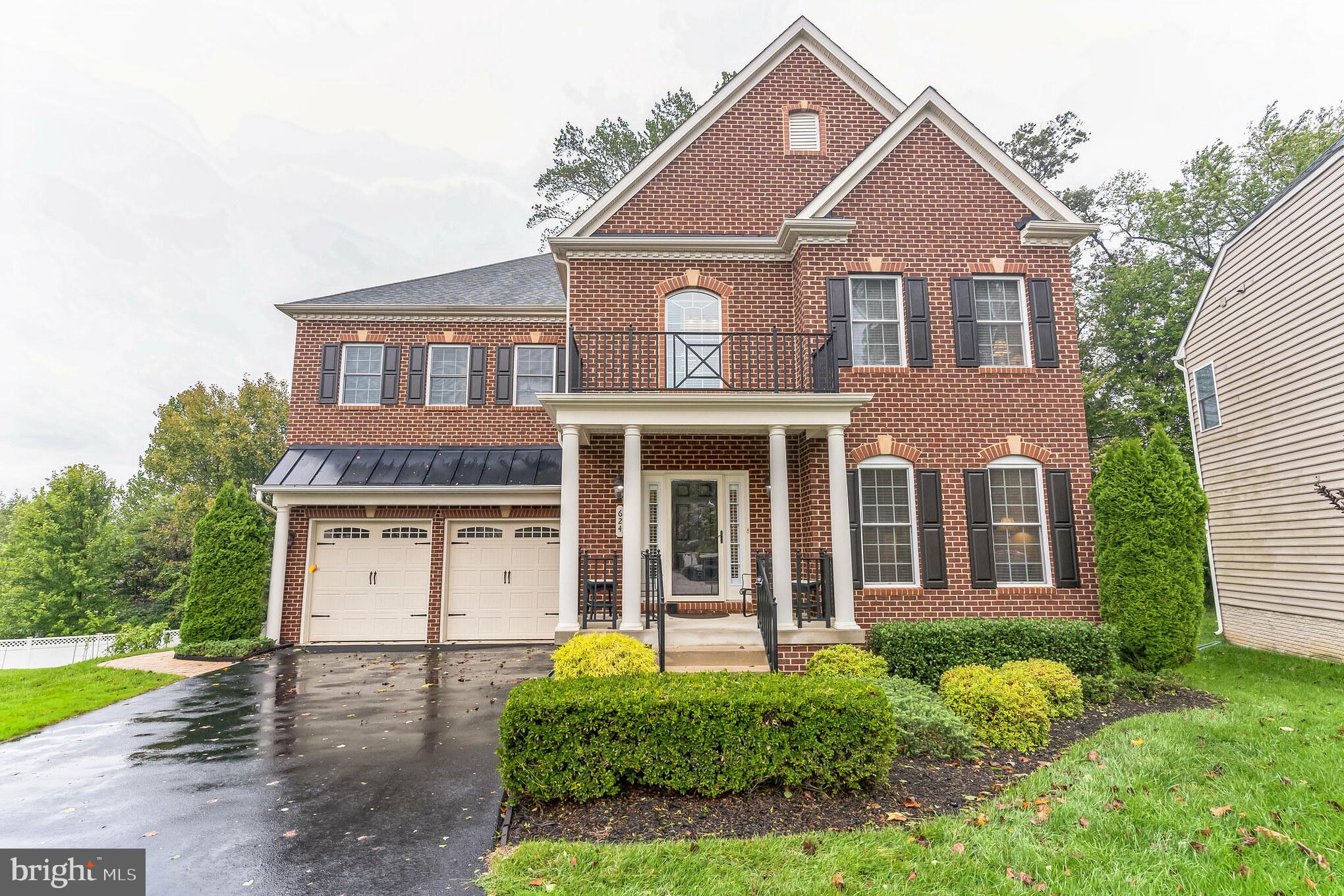 Sellers are offering $50k towards down payment or closing costs to buyer. Elegantly designed brick-front and beautifully maintained executive colonial located in the Broadneck Penisula among other community colonial homes near to historic Annapolis and great area amenities.  Large home with Stately dual staircase foyer with majestic two-story family room with grand windows, a private room with glass doors for your baby grand piano, and a convenient sunroom that walks out to your large, raised deck that overlooks a private wooded backyard.  Kitchen with upgraded cabinets, granite countertops, and stainless appliances.  A large eating area with wonderful built-ins for storage and displaying your collectibles too.  4 large bedrooms.  Master bedroom with his and her walk-in closets.  Luxury master bathroom with lovely soaking tub and large shower.  Jack and Jill bedrooms and bath.  A large private bedroom with its own on-suite bathroom as well.  The upstairs hallway overlooks the great family room and foyer and grand windows allowing lots of light into this beautiful home.  Two-car garage, first-floor laundry, and huge finished walk-out basement to a private rear patio.  The basement is finished to include large storage areas and a full bathroom as well.  An upgraded paver walkway from the front of the home allows easy access to your private walk-out basement.  Great potential for a large in-law apartment should that be a possible buyer’s need now or in the future.  Wonderful raised front porch to sit and enjoy your afternoon sunshine that overlooks an exceptionally large court.  The community HOA cuts and edges the grass.  The home has a complete yard watering system with a sensor so that the system does not water on rainy days and a whole house Generac 22KW generator that works automatically during any power outages that run on piped-in natural gas and will run until the power returns.  An awesome safety feature and living convenience.  The home has an alarm system. Come, make this low-maintenance home with its great features yours.  It will not last long!