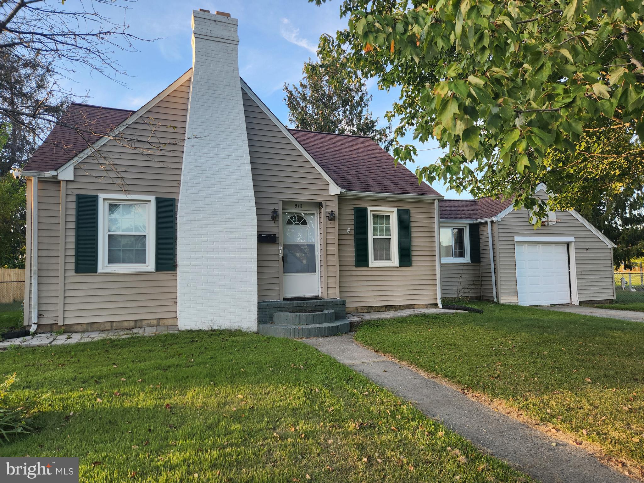 Nestled in the charming Wilmar Village, this delightful Cape Cod-style home exudes warmth and character. Built in 1990, this detached residence offers a perfect blend of classic design with recent KITCHEN UPDATES INCLUDE NEW UPPER CABINETS AND FRESHLY PAINTED  giving the kitchen and breakfast are more light airy and modern comfort appeal. The exterior features a classic façade with a capped chimney accentuated  by exterior lighting.  s. The thoughtfully designed layout includes three bedrooms and two full bathrooms, ensuring ample space for relaxation and privacy. The property boasts a generous 0.23-acre fenced corner lot, providing plenty of room for outdoor activities or gardening. Sidewalks and street lights in the neighborhood create a welcoming environment for evening strolls. Possibilities are endless with an unfinished basement equipped with a sump pump and additional space  for extra storage. This home is not just the place to live; it’s a canvas for creating lasting memories whether this is your first home or your forever home. Experience the charm and comfort of this inviting residence in Wilmar Village, where every detail is designed to make you feel at home.