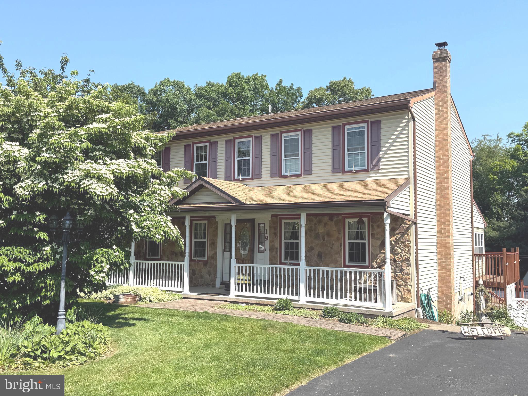 This spacious two-story home situated on a quiet street and in the Elizabethtown School District offers 5 bedrooms, 3.5 bathrooms, and over 3,200 square feet of living space. It is connected to public water and public sewer, and features efficient propane heat paired with central air conditioning. The home is equipped with two HVAC systems  to ensure consistent comfort throughout the house.  Use the living room wood stove to help with heating costs and keep everyone warm and toasty.  The first floor family room with vaulted ceilings is an amazing space that offers so many different options.  Beautiful hardwood flooring in the kitchen, breakfast area, dining room and foyer.   You are going to love the updated kitchen complete with loads of cabinetry and counter space, separate bar sink and many of those specific use cabinets.  The kitchen is truly a great upgrade to this home.  This space provides plenty of room for cooking, meal preparation and conversation with all who end up in the kitchen!  With five bedrooms and multiple bathrooms, the layout offers excellent potential for an in-law suite or multi-generational living arrangements.  There is an enclosed porch off the breakfast area overlooking the back yard and is a great space for relaxing without worrying about the weather or bugs and also overlooks the above-ground swimming pool and is perfect for keeping an eye on your swimmers!   Now for the cold winter months, there is a separate, enclosed indoor room featuring a built-in hot tub.  The detached 2 bay garage is perfect for all the toys and tools that come with home ownership.  This description truly only scratches the surface so schedule your tour today and see if this isn't the home for you!  Please note.the public record states the lot size is .69 acres but the recorded subdivision plan states the lot size is .757 acres.