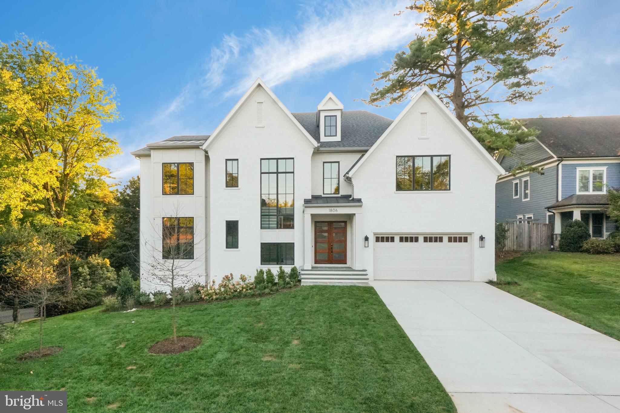 This exceptional new residence from Cherry Hill Custom Homes blends timeless elegance with modern luxury in the heart of sought after McLean. Spanning 7,252 finished square feet of living space across three levels, the home features 6 bedrooms, 5 full bathrooms, and 2 powder rooms. Cherry Hill has designed every detail with meticulous care, incorporating high-end finishes and bespoke touches throughout. The main level features soaring 10-foot ceilings, a gourmet kitchen with a rear scullery, and a sunlit breakfast nook perfect for casual dining. The kitchen opens to a spacious great room with a coffered ceiling and gas fireplace, seamlessly connecting to a screened porch that offers a beautiful outdoor retreat. This level also includes a formal dining room, a generous home office, a two-car garage, a well-appointed mudroom with custom built-ins, and a stylish powder room. The second floor is highlighted by a lavish primary suite, complete with two walk-in closets and a luxurious spa-like bathroom. Each additional bedroom on this level is paired with its own private en-suite bathroom. The walk-out lower level is designed for entertainment and relaxation, complete with a recreation room with a wet bar, a wellness room, an additional bedroom with a full bath, as well as a flexible bonus room that can be customized to suit your needs. For added convenience, the home is prepped with a built-in elevator shaft, offering the option for future installation. Please reach out to the listing agent for more information or to schedule an appointment.