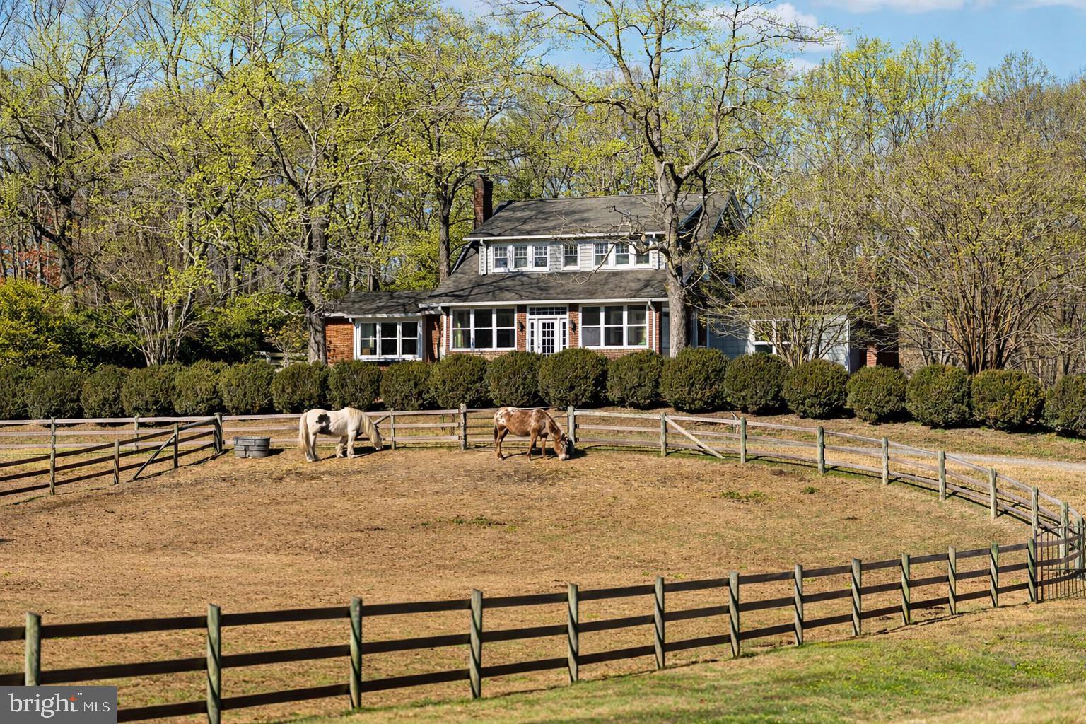 There is a particular kind of quiet that exists here. Not the absence of sound, but the presence of serenity.
The kind that settles over you the moment the gate closes behind you and the city, with all of its weight, simply falls away.

Single Arrow Farm has been here since 1932. Ninety-plus years of southern Maryland seasons, a once operational tobacco farm that now holds a competition-grade equestrian facility and a farmhouse that has seen enough life to know what matters. What stands today is the result of that history meeting serious, deliberate investment. More than $600,000 poured into updates, upgrades, systems, structures, and spaces so that the next person who calls this home steps into something that is already whole.

The farmhouse is exactly what it should be. Original hardwood floors, refinished and warm underfoot. A large kitchen perfect for lively gatherings to share this beautiful property with those you love. Four bedrooms, two bathrooms, and 2,272 square feet arranged in the unpretentious bones of a 1932 Colonial that has been updated without being erased. Every mechanical system in the home has been replaced or reinforced; the plumbing, the electrical, a full four-zone HVAC, a whole-home Culligan water filtration system, a new well pump, fresh insulation from attic to crawl space. The California Closet primary suite and Shade Store treatments throughout reflect the same attention to daily comfort that runs through every corner of this residence. Nothing here asks you to repair.

Outside, the farm opens up into something so welcoming and peaceful that it has to be walked to be fully understood. 40 acres, 14 of them wooded with maintained riding trails that follow a creek, pass two historic tobacco barns, and open into a wide back field so private it feels like a separate world entirely. The 12-stall barn operates with the kind of calm reliability that serious horse people spend years trying to build. Climate-controlled tack and feed rooms. Hot and cold wash stall with heat lamp. Centaur-fenced pastures with electric power throughout. A Pyranha fly spray system on a set schedule. Live camera feeds in every stall and throughout the barn so you always know what is happening, whether you are in the barn or back in the city. Three-zone mini-split HVAC keeps the barn comfortable through every season. For a resident trainer, a farm manager, or an overflow guest, the barn also includes a fully renovated and appointed studio apartment with a private full bathroom, so the people who keep this place running have a proper place to land.

The 240x60 lighted outdoor clay based arena with sand and fiber footing with mirrors was built for performance. The available round pen supports foundational work. The trails support everything else. Whether this farm is your primary training ground, your weekend reset, or the asset you have been building toward, the infrastructure is already here and already proven. A stabilized boarding operation currently generates six figures annually, with room to grow. This entire operation is fully turn-key and ready to step into with infrastructure, local support, scheduled supply vendors, access to top trainers, farriers and veterinary care and wonderful boarders. 

What Single Arrow Farm offers, more than the acreage, more than the systems, more than the arena and trails and the income, is the feeling that you have arrived somewhere that was built to last. The work has been done. The foundation is solid. All that remains is the life you choose to build here.

Local Amenities Near Single Arrow Farm

Brandywine Crossing Shopping Center: 11 miles
Prince George's Equestrian Center: 16 miles
Southern Area Aquatics & Recreation Complex: 9 miles
Joint Base Andrews: 19 miles
Annapolis, MD: 40 miles
Washington, DC: 29 miles
Alexandria, VA: 28 Miles