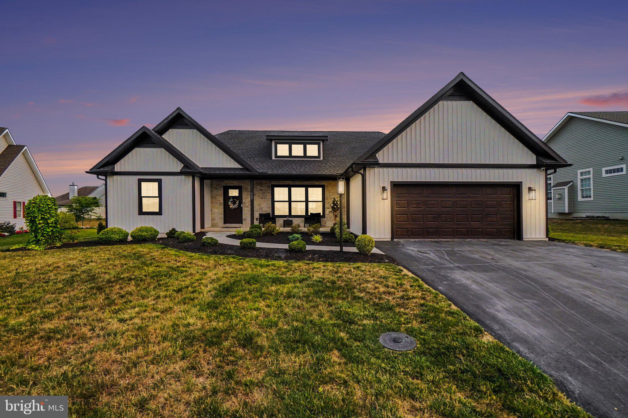 Welcome to 227 Daisy Drive, where thoughtful design, premium upgrades, and exceptional outdoor living come together in one stunning custom ranch. Built by S. Gerald Musser in the desirable Mapledale Estates community, this 3-bedroom, 2-bath home offers 1,685 square feet of beautifully finished main-level living with a full unfinished basement ready for your vision.
From the moment you arrive, the home's modern farmhouse curb appeal, professional landscaping, and inviting front porch set the tone for what awaits inside. The open-concept floor plan features soaring cathedral ceilings, abundant natural light, luxury finishes, and seamless spaces designed for both everyday living and effortless entertaining.
The gourmet kitchen is the centerpiece of the home, offering custom cabinetry, quartz countertops, stainless steel appliances, a large center island, pantry, and generous workspace overlooking the spacious living and dining areas.
Retreat to the private owner's suite featuring a tray ceiling, walk-in closet, and a beautifully renovated spa-inspired bathroom with dual vanities and an oversized custom tiled walk-in shower.
Two additional bedrooms provide flexibility for guests, family, or a dedicated home office, while the conveniently located main-floor laundry room makes daily living easy.
The expansive full basement offers endless possibilities. Whether you're dreaming of a home theater, golf simulator, fitness center, recreation room, additional bedrooms, or simply exceptional storage, the space is ready to accommodate your lifestyle.
Step outside and discover what truly sets this property apart. The professionally designed backyard features a stunning timber-frame pavilion, expansive paver patio, built-in seating walls, fire pit, aluminum fencing, and beautifully landscaped grounds—creating an outdoor retreat perfect for relaxing or entertaining throughout every season.
Additional highlights include an oversized two-car garage, natural gas utilities, public water and sewer, and a quiet cul-de-sac location within the highly regarded Cornwall-Lebanon School District.
This is more than a home. It is a lifestyle.