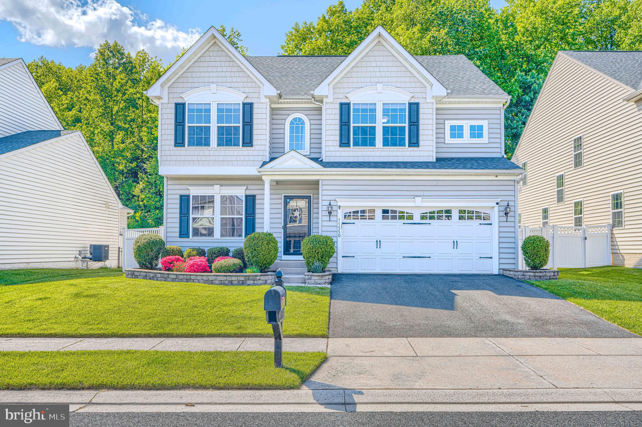 Price Improvement in Highly Desirable Fieldcrest - Stunning 5 Bedroom, 3.5 Bath home, loaded with stylish upgrades and over 3,500 square feet of beautifully finished living space! This spacious home offers an open, functional layout designed for both everyday living and entertaining.  The gourmet kitchen serves as the heart of the home, open to the family room and breakfast room.  Recessed lighting, beautiful finishes, and direct access to the rear deck — perfect for unwinding at the end of a day or outdoor dining.  Elegant flooring flows throughout the home, creating warm and inviting spaces filled with natural light.   The expansive upper level features 4 bedrooms, highlighted be the primary suite with tray ceiling, large attached bathroom and large walk-in closet.   A posh upper level laundry room with new washer & dryer and a hall bathroom round out the top floor.  Downstairs, the recently finished (2021) lower level adds approximately 1,000 square feet of additional living space.  A potential in-law suite includes a private 5th bedroom with egress window, full bath with walk-in shower  and linen closet.   The large recreation area boasts a wet bar with quartz countertops, a beverage refrigerator and built-in microwave.  Additional space in the basement for office or home gym.  Outside, enjoy a large fully fenced backyard with newer privacy fencing — perfect for pets and gatherings.  Additional highlights include a spacious 2-car garage, well-maintained driveway, and beautifully landscaped front and rear yards.  Minutes to the areas finest shopping and dining and convenient to major roadways.  Schedule your showing today!