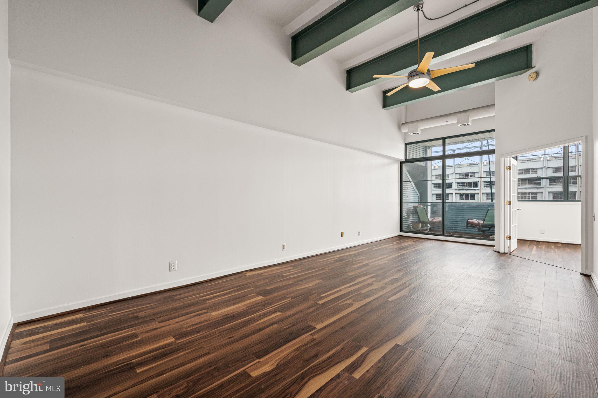 Welcome to this beautifully updated waterfront condo featuring stunning views of the iconic Ben Franklin Bridge. This desirable one-bedroom corner unit boasts impressive 16-foot ceilings and a thoughtfully designed layout. <p>

<P> Step into the foyer, where the updated kitchen sits to your right. The owner has lovingly upgraded the apartment, including new hardwood flooring throughout. The kitchen features lovely backsplash tiles, quartz countertops, brand-new stainless steel appliances, and a pantry — a rare and convenient bonus in condo living.<p>

<p> The bright and spacious living and dining area is enhanced by floor-to-ceiling windows that flood the space with natural light. Sliding doors lead to your private balcony, where you can relax and enjoy picturesque views of the Delaware River — and even the option to dock your own boat right outside. <p>

<p> French doors open to a generously sized bedroom with ample closet space and large windows, allowing you to wake up to the same beautiful views. This unit also includes a full-size washer and dryer for added convenience. Additional upgrades include a newer HVAC system and hot water heater, offering peace of mind.<p>

<p> Pier 3 Condominiums offers a wide range of amenities, including an indoor heated pool, state-of-the-art fitness center, 24-hour concierge service, secure indoor gated garage parking, and a newly renovated rooftop atrium. Residents also enjoy a private viewing area for holiday fireworks. <p>

<p> Ideally located, this condo provides easy access to I-95, I-76, Philadelphia International Airport, and is just a short stroll to Center City. You’ll also be within close proximity to Spruce Street Harbor Park, home to popular Summer Fest and Winter Fest along the newly developed waterfront. <p>

Schedule your appointment today and experience the tranquility of waterfront living.
