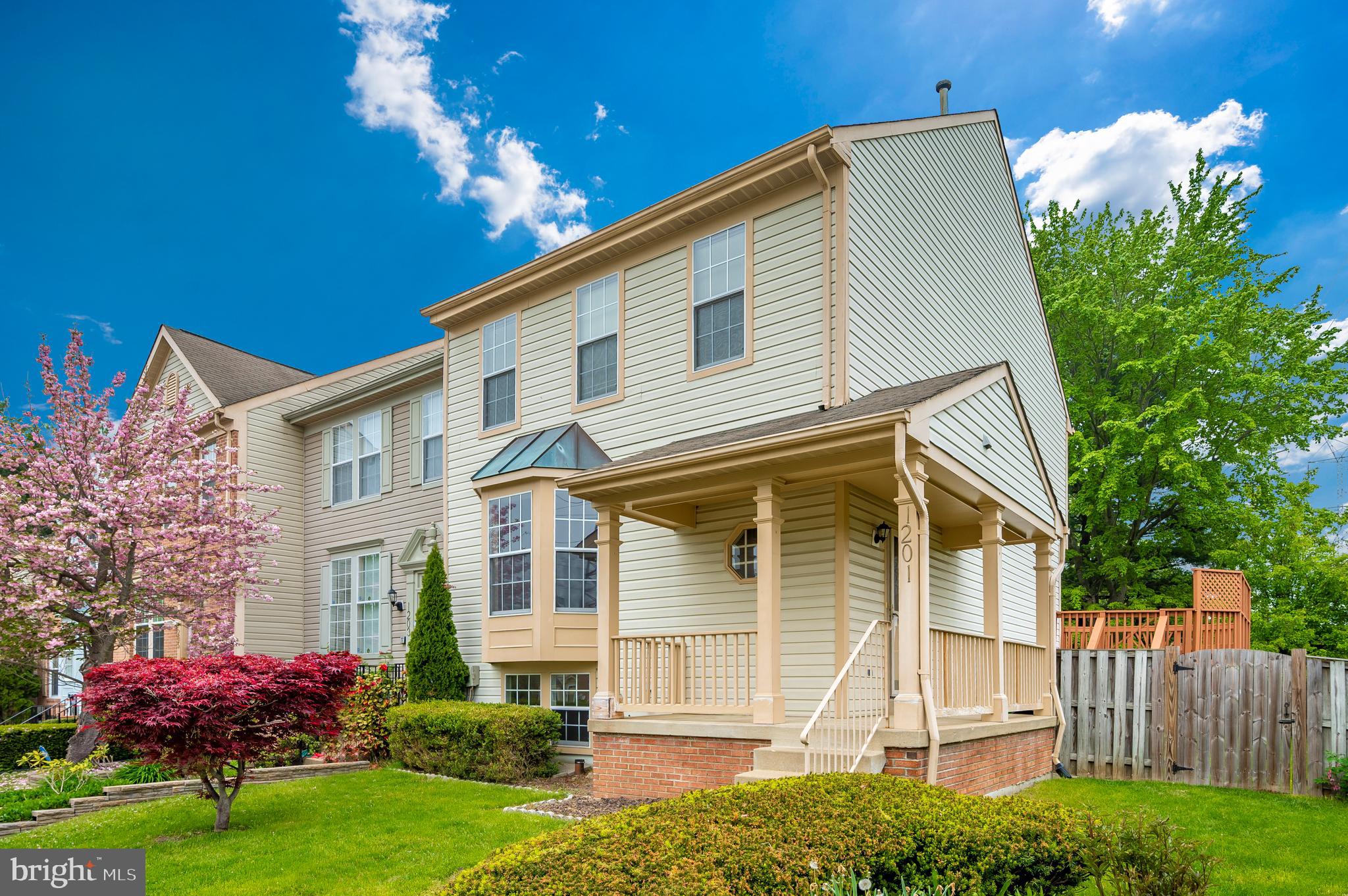 This charming and spacious end unit townhome is situated in a prime location, offering everything you've been looking for. Enjoy the fenced-in backyard and large deck, perfect for outdoor entertaining and relaxation, along with beautifully landscaped front and back yards. The upper level features three large bedrooms and two full baths, providing ample space and comfort. The eat-in kitchen is ideal for casual dining and family gatherings. The lower level includes an extra bedroom, a full bath, and a recreation room with walk-out access to the backyard. Don't miss out on this incredible opportunity – this home is a true gem and won't last long!