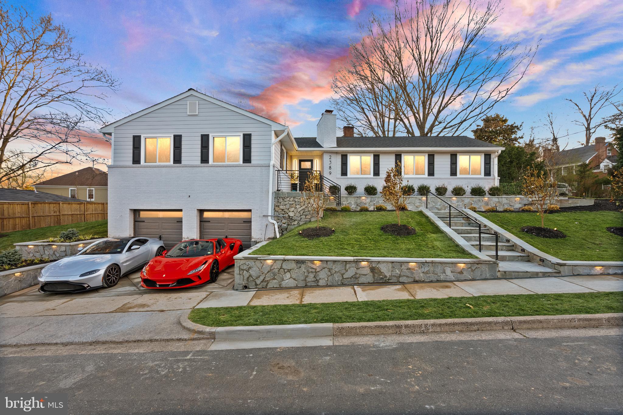 Stunning Custom Rebuilt Home on 1/4 Acre Corner Lot. This beautifully rebuilt custom residence boasts an array of high-end features and modern amenities, nestled on a generous 1/4 acre corner lot. New roof,  siding, windows, gutters, landscaping,  and retainging walls outside. New electric, plumbing, havc, insulation, drywall on the inside. Enjoy vaulted ceilings adorned with charming beams, coffered accents, and custom tile work throughout the home. Cook and entertain in style with a custom waterfall kitchen island featuring quartz countertops that flow up the backsplashes, custom black and walnut kitchen cabinets with $40,000 in professional appliances throughout. This home includes a wine cellar, spacious butler's pantry and a full bar to impress your guests. Unwind in the cozy movie theater, or enjoy outdoor movie nights with an outdoor TV. Modern bidet toilets with remote controls and energy-efficient spray foam insulation enhance comfort and sustainability. 2 electric car plugs in garage. Smart appliances, smart TV's central control center for Cat 6 to each room with Coax. Stay warm by one of the two fireplaces, while you charge your cars in the insulated garage with two electric car plugs. The home also features new electric and plumbing to the street and a brand-new Carrier HVAC system. An all black mudroom with built-in benches and golden coat hooks adds practicality to your daily routine. Located just 2 traffic lights away from DC, this home is conveniently situated close to everything you need. It’s only 5 minutes to Georgetown, offering an array of shopping, dining, and entertainment options. This exquisite property is too much to list! Don’t miss out on the opportunity to call this remarkable house your home. Schedule a showing today!