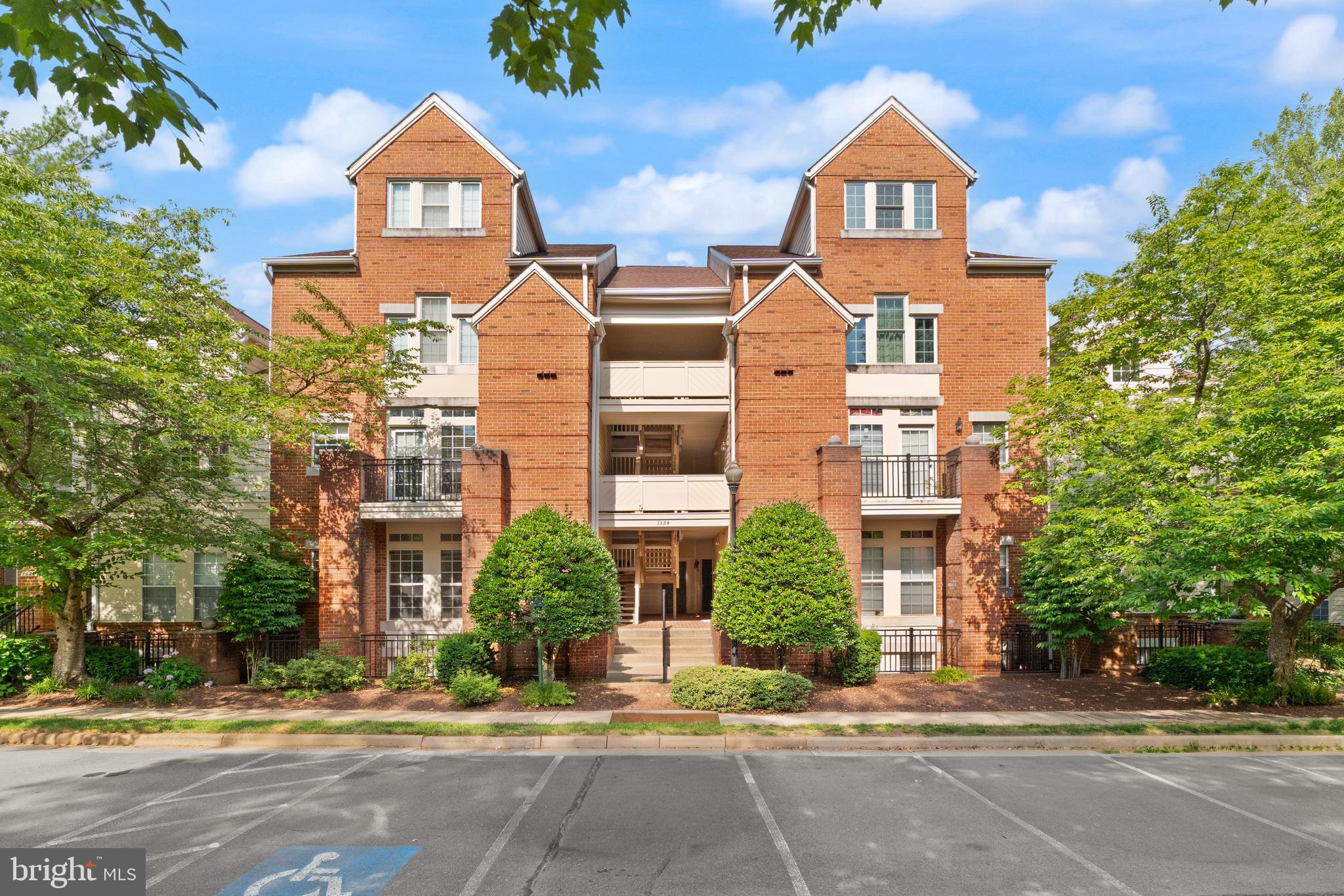 Bright and spacious 1053 sq feet, 2-bedroom, 2-bathroom condo in the conveniently located Baldwin Grove community. This well-maintained home features fresh paint, new carpeting, a cozy gas fireplace, new countertops, and stainless-steel appliances. Hardwood floors enhance the main living areas, while a large private balcony overlooks a peaceful, tree-lined courtyard and includes a convenient storage closet.

Located on the second level, the unit offers abundant natural light and requires only a few steps from the parking area for easy access. Enjoy a prime location within walking distance of shopping and just a short drive to the Metro station and Reston Town Center.