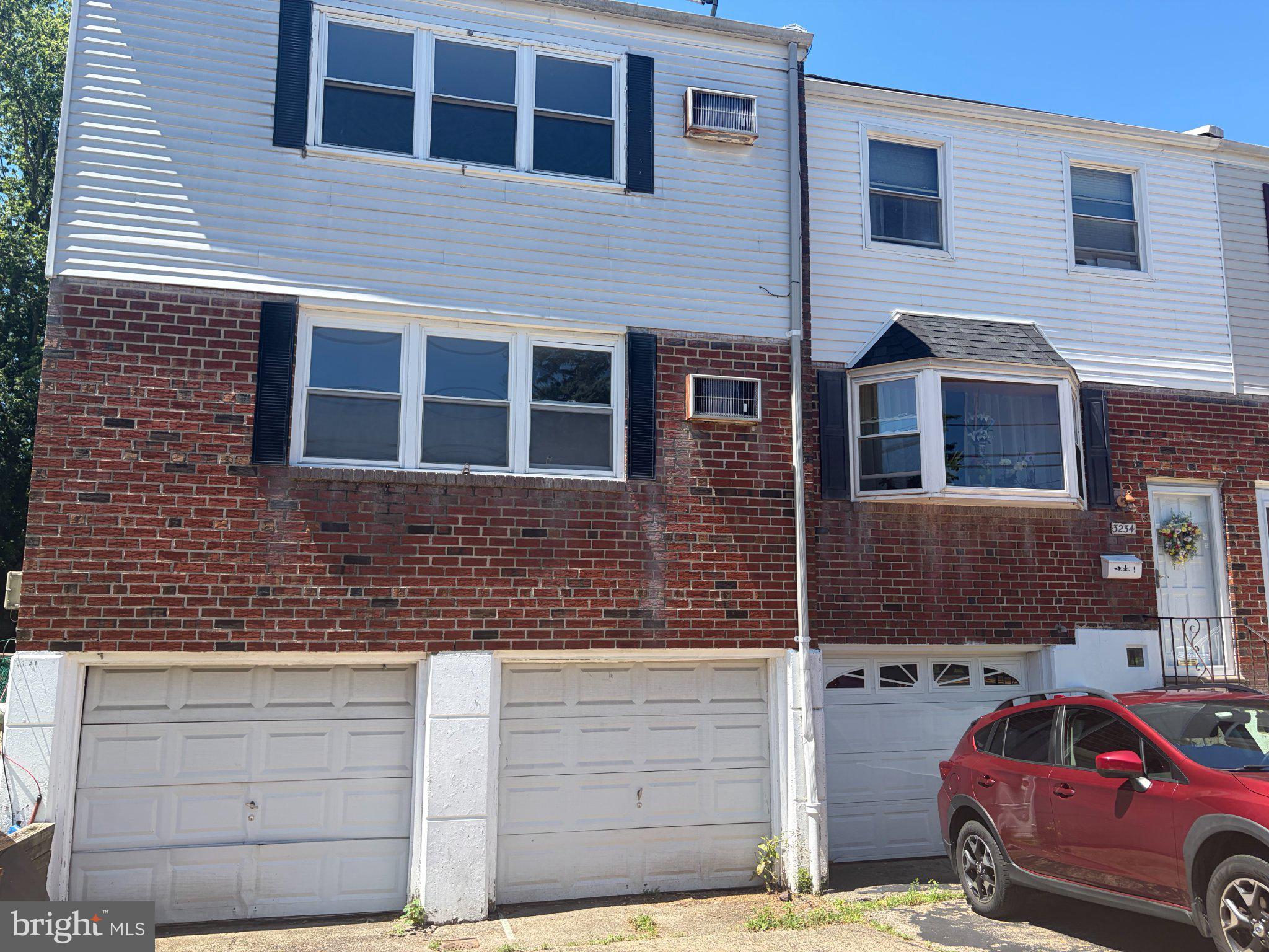 Great investment or owner-occupant opportunity in Northeast Philly. This end-row duplex 2+2 offers the spacious feel of a twin home, featuring a classic brick exterior. Both two-bedroom units has kitchens, living room and full bath, central heating and separate utilities for effortless management. Each unit has its own garage and driveway plus laundry hookups. Property is being offered as is