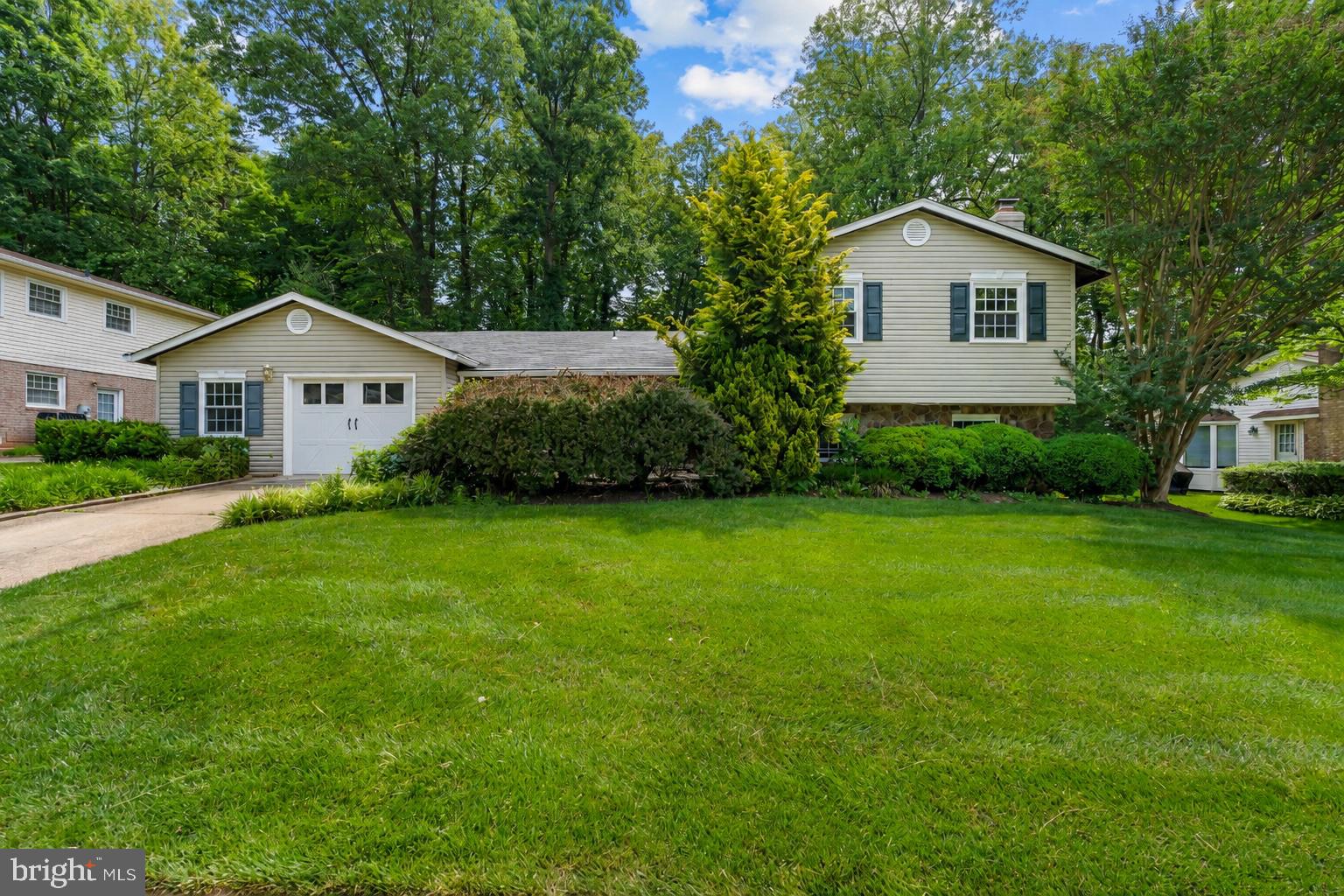 Welcome to 5015 Gadsen Drive, a beautifully maintained 5-bedroom, 3.5-bath home offering a spacious and functional layout with thoughtful updates throughout.

The updated kitchen, renovated in 2013, opens seamlessly to the main living and dining areas, creating an inviting space for everyday living and entertaining. A desirable main-level primary suite provides convenience and flexibility, featuring a beautifully renovated primary bathroom completed in 2026. The main level was expanded in 2007 with an addition that included a new roof and stonework, while updated flooring was installed throughout the main level in 2014.

Additional recent improvements include luxury vinyl plank flooring in the basement (2026), new carpet (2026), and an updated shed with electricity (2026), offering versatile space for storage, hobbies, or a workshop.

With five bedrooms, 3.5 baths, a new garage, and generous living spaces, this home offers the perfect combination of comfort, functionality, and modern updates in a desirable Fairfax location.