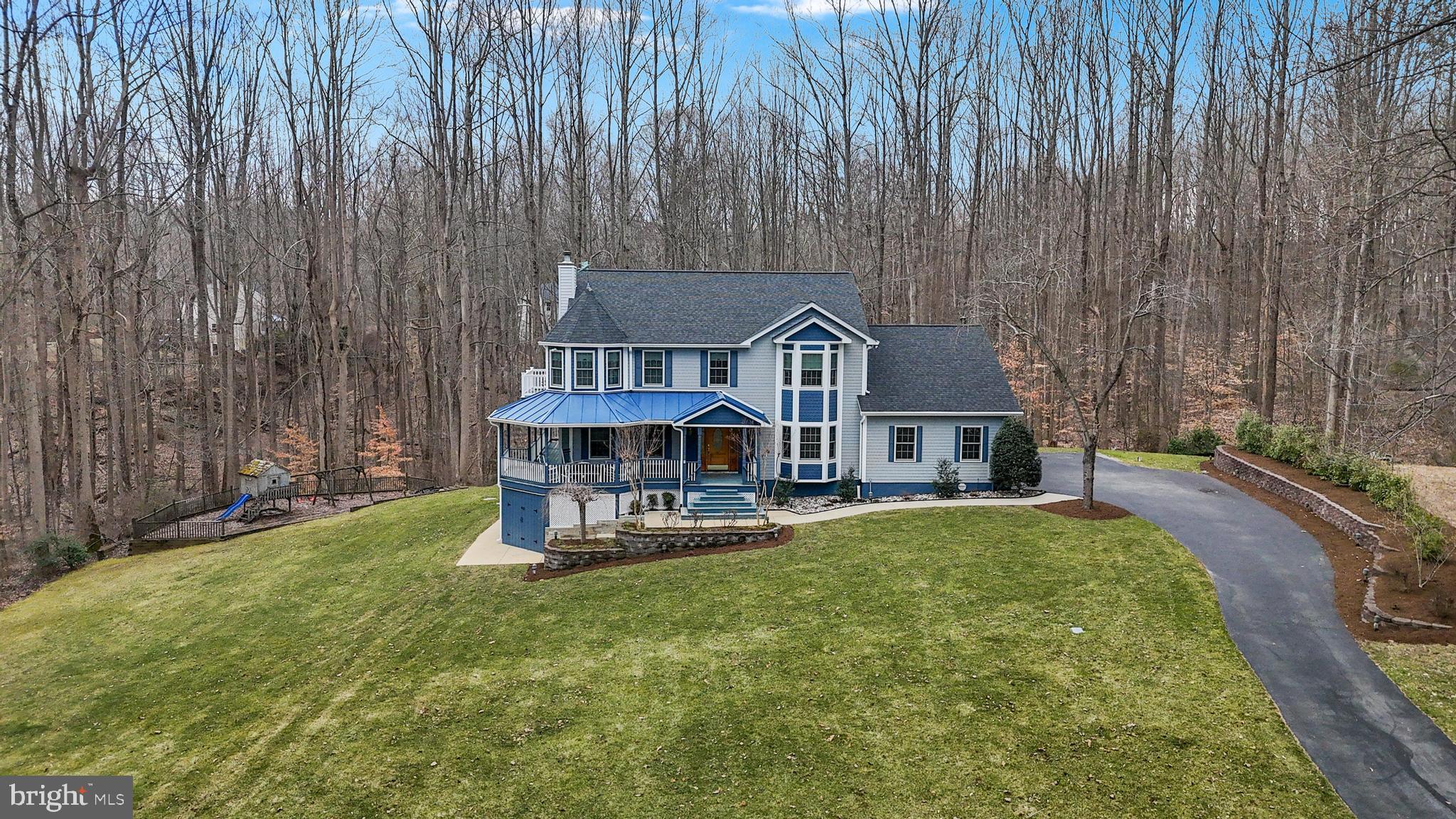 *Sellers have received multiple offers, a deadline has been set for Wednesday, March 19th at 11:00 AM. Best and final offers are to be submitted by then, with a decision from the sellers that day.*    Located in one of Huntingtown’s most sought-after neighborhoods, Peach Blossom Farm, 3131 Jubilee Court is being offered for the very first time!! You will be more than pleased viewing this home from the moment you pull into the driveway, noticing every intricate detail of the exterior. All the way to the interior, where you will notice the extreme care and maintenance that these owners have poured into the home throughout the years. The large wrap around porch is ideal for watching nature in your nearly three acres of wooded, private land! Flat, usable yard space for every sport, garden or playground you can imagine! As you enter the home you are welcomed with a grand 2-story foyer, real hardwood floors and moldings galore! To your right, you'll find the ideal office space featuring a bay window that floods the room with natural light. To your left, is the perfect place for your formal living area with just ONE of the wood fireplaces that the home offers. A designated dining room large enough for your entire dining set. Both rooms bring class and elegance to the home with the shadow boxes and crown molding to complete the space! The chef inspired kitchen flows seamlessly into the breakfast nook and main living room, making it perfect for gatherings or entertaining. Don’t forget to look up at the unique copper ceiling and matching copper sink. This space offers so much cabinetry, granite counter space and stainless-steel appliances. The perfect kitchen for the chef of the home! The second wood fireplace can be found in the main living room, with vaulted ceilings and access to the expansive back deck! Upstairs you will find 4 large bedrooms, some with newer carpet! The owner’s suite is just that, A SUITE! Built with its own turret, a private balcony, en-suite bathroom complete with a soaking tub, walk-in shower and double vanities, a walk-in closet and vaulted ceilings! The finished basement would be great for entertaining guests, a tenant or a long-term house guest with its fully functioning kitchen. There is also rec room space, a gym area, a bedroom area, another full bathroom and an unfinished storage room/workshop space! The walk out basement is great for access to the yard or the concrete walkway to the front of the house. 3131 Jubilee is just what you have been looking for – snag it before someone else does! Roof (2019) Windows (2022).
