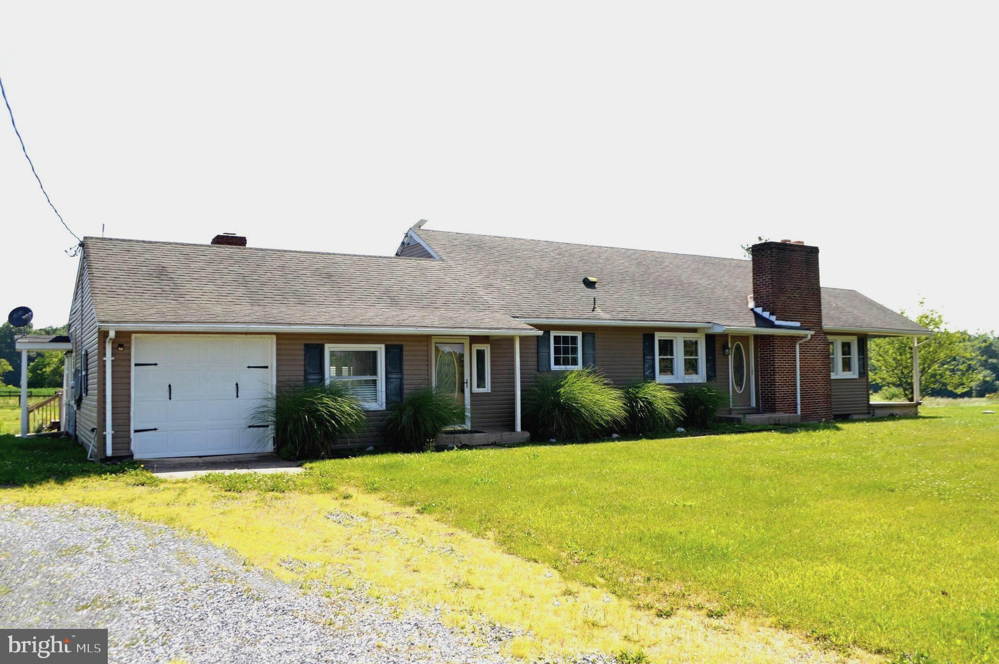 NEW IMPROVED PRICE! This charming 10.95-acre farmette offers three fenced, level pastures, each thoughtfully equipped with Nelson 700 Series automatic waterers (installed in 2023) and Flex fencing (installed in 2021 and 2022). Two of the pastures also include convenient run-in sheds.  The barn provides ample storage and is already set up with two stalls. Inside the home, you’re welcomed by a comfortable family room and a bright sunroom just off the kitchen. The kitchen features a farmhouse sink, granite countertops, and stainless steel appliances. A separate dining room, three bedrooms, and a primary suite with a private bath complete the layout.  Recent updates add even more peace of mind, including a new 10kW backup generator (2024) and a new HVAC system (2023).  Come take a look—you won’t want to miss it!