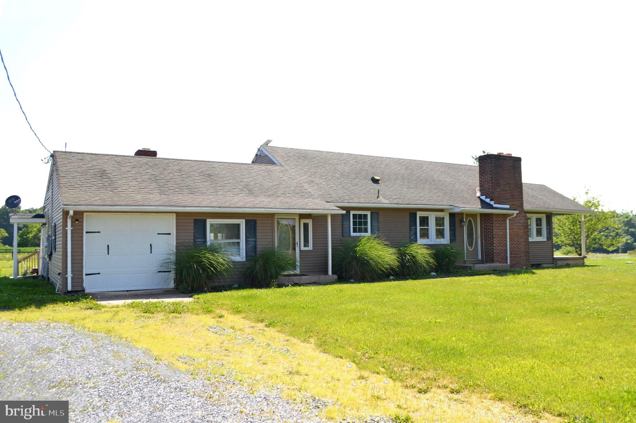 NEW IMPROVED PRICE! This charming 10.95-acre farmette offers three fenced, level pastures, each thoughtfully equipped with Nelson 700 Series automatic waterers (installed in 2023) and Flex fencing (installed in 2021 and 2022). Two of the pastures also include convenient run-in sheds.  The barn provides ample storage and is already set up with two stalls. Inside the home, you’re welcomed by a comfortable family room and a bright sunroom just off the kitchen. The kitchen features a farmhouse sink, granite countertops, and stainless steel appliances. A separate dining room, three bedrooms, and a primary suite with a private bath complete the layout.  Recent updates add even more peace of mind, including a new 10kW backup generator (2024) and a new HVAC system (2023).  Come take a look—you won’t want to miss it!