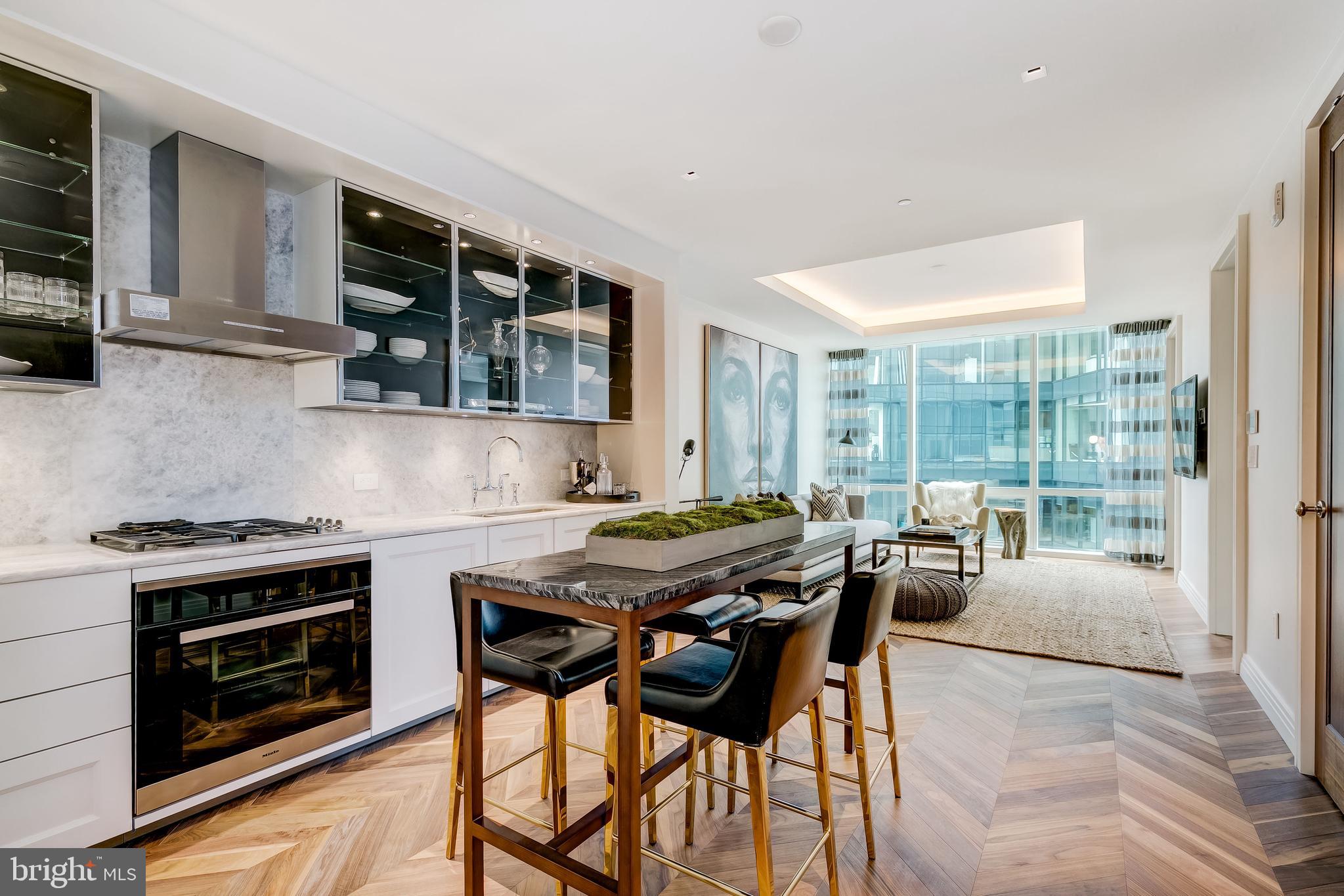 Experience the very best of city living from this beautiful 19th floor home in the prestigious Four Seasons Private Residences.  Located in Baltimore's popular Harbor East, this one-bedroom, one and half bath home offers  luxurious living with an open layout flowing through the kitchen, dining, and living areas. The 10-foot ceilings and floor-to-ceiling windows bring in bright natural light throughout.  Luxury abounds with walnut herringbone wood flooring, designer light fixtures, and a stunning gourmet kitchen featuring  Miele appliances.  A serene primary suite offers a large walk-in closet and marble en suite bath with a dual vanity.   As a resident, you’ll enjoy the signature Four Seasons service and amenities that redefine luxury living.  From personalized lifestyle services to long-term property management, the Four Seasons Private Residences promises a refined, worry-free ownership experience in Harbor East’s most coveted location.  Step outside and enjoy Baltimore's waterfront, charming shops and restaurants, waterfront activities, and everything the city has to offer. This property is also for rent.