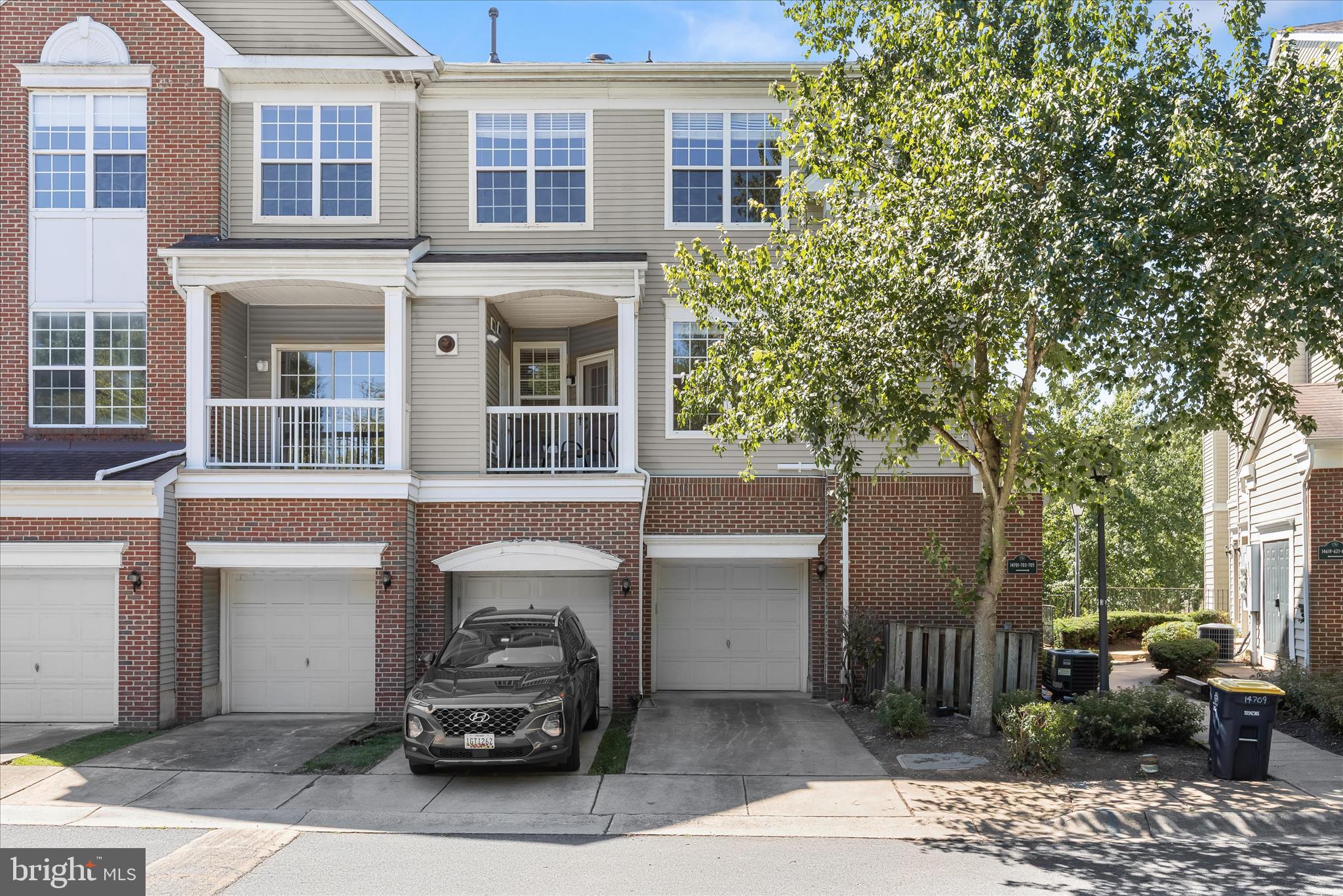 Nestled just outside of historic downtown Upper Marlboro, this move-in ready garage townhome condominium features two spacious bedrooms and two full bathrooms. Walk through a charming courtyard-style entrance into the main-level foyer, complete with ceramic tile floor, two coat / storage closets, and direct access to the attached garage. Finished garage has been beautifully updated with fresh paint and durable epoxy coated floor, which provides a sleek, stain-resistant surface that wipes clean with a simple mop or rag.

Upgraded luxury vinyl plank flooring guides you up the staircase to an expansive, open-concept main level that seamlessly blends the kitchen, dining, and living areas. The kitchen boasts granite countertops, modern updated appliances, a pantry, and a tucked-away laundry closet. The adjoining dining room features warm hardwood floors, flowing into a bright living room accented with durable vinyl flooring and a cozy gas fireplace with a decorative mantel. Perfect for entertaining, this floor plan opens to a quaint covered balcony—an ideal year-round retreat for your morning coffee or a thriving plant sanctuary. Large windows throughout the home fill the living spaces with abundant natural sunlight, creating a warm and inviting atmosphere.

The top floor welcomes you with a wide hallway and a versatile bonus area perfect for a dedicated home office or study area.  A generous primary suite with vaulted ceilings offers a walk-in closet and a private, updated full bathroom featuring beautiful tile flooring and a tiled tub surround. A spacious second bedroom and an additional updated full bath complete the upper level. As with the main level, the top floor enjoys plenty of natural light, enhancing the airy feel throughout all the rooms.
 
Outside, enjoy a private driveway and ample visitor parking. The community showcases a park-like setting with open common grounds, gazebos, a tot lot, grilling areas, and mature, tree-lined streets with sidewalks. The association lovingly maintains the landscaping including the freshly laid mulch! Less to maintain and more to enjoy when living in Hampshire Hall!

Conveniently located near shopping, schools, and the popular Dutch Farmers Market within walking distance. Close to downtown Upper Marlboro, commuter lots, major highways, and a short distance to the Metro. Central location with convenient access to Joint Base Andrews, Joint Base Anacostia-Bolling, the Pentagon, and other major government and military installments throughout the region. Ideal for effortless travel throughout the DMV!