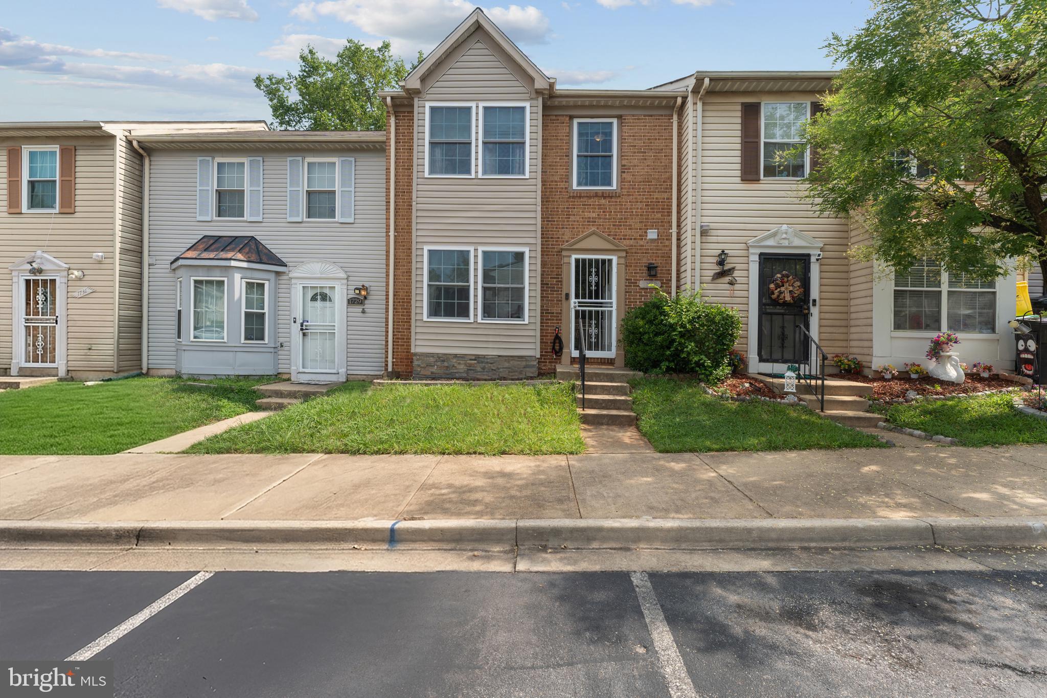 Welcome to 1727 Countrywood Ct, a move-in ready 3-bedroom, 2.5-bathroom townhome offering light-filled spaces and modern updates throughout!

The open-concept main level features low-maintenance flooring, neutral paint, and seamless flow into an updated kitchen. Designed for home chefs, the kitchen boasts white shaker cabinets, quartz countertops, a mosaic tile backsplash, stainless steel appliances, and a convenient breakfast bar. Walk through French doors to your private, fully fenced backyard featuring a patio and green space—perfect for outdoor entertaining, pets, and gardening.

The upper level highlights a spacious primary suite complete with soaring vaulted ceilings, a dark feature accent wall, ample closet space, and an en-suite bath. Two additional bedrooms and a full hall bathroom offer plenty of space for family, guests, or a home office.

Enjoy main-level laundry and a prime Landover location close to I-495, Route 50, Landover Metro, shopping, dining, and local parks. Don't miss this Prince George's County gem—schedule your private tour today!