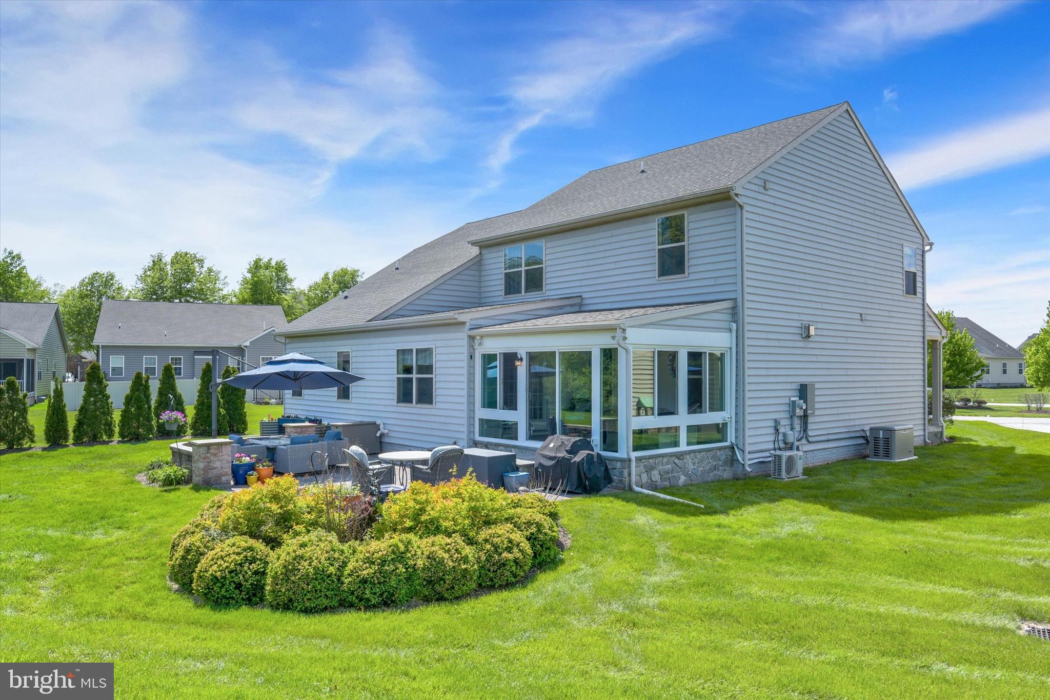 Outstanding 4224 sqft, 4 bedroom, 2 full and 2 half bath,  2015 home  on .27 acre private, manicured lot backing up to farm land in sought-after Links of Gettysburg, just minutes outside historic downtown Gettysburg and battlefield lands.  Hardwood floors through-out open floorplan main level includes a large airy dining room, a large upgraded kitchen (quartz counters, stainless steel appliances, 2 large pantries,  breakfast nook, island, double sink, variable height cabinets and gorgeous glass tile backsplash), an office, a flagstone floor heated and cooled sunroom with private farmland view,  laundry room, powder room, living room with stacked stone-front gas fireplace and primary bedroom with walk-in closet and on-suite bath featuring  a double bowl sink, soaking tub ad large walk-in tiled shower. Second level includes a bright inviting loft area, along with 3 bedrooms (all with walk-in closets) and a full hall bath. Newly finished lower level has luxury vinyl plank flooring through-out large family room with powder room and kitchen-ette (w/sink, refrigerator), along with a sizable storage room complete with built-in wooden shelving.  Rear area of home boasts a large paver patio, and HOA-provided sprinkler system for the lawn.  Of course the HOA takes care of the the lawn care, snow removal, trash, along with a multitude of amenties including an in-ground pool with waterfall, community center, play area, tennis courts, exercise room, pro shop with grill, event center, tons of walking, clubs and opportunities for golf memberships.  A few miscellaneous items of note are that the house comes with a Kohler whole house generator, tankless water heater, upgraded gas service, 2 electric panels to allow for adding anything you want, water softener and filter, garage with level 2 electric car charger, Seller are moving to warmer climate and everything in house is negotiable except 2 rocking chairs in nursery.