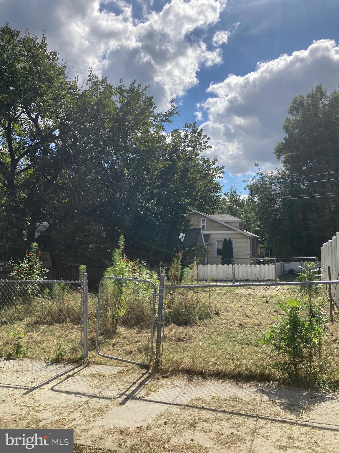 39 ft wide by 57.5 ft depth 2243 sq ft R2 zoned vacant lot between 1019 Taussig Pl NE and 1041 Taussig Pl NE, both detached houses. 15 ft wide alley in rear. Application for 1027 Taussig Pl NE address is in process. Lot needs several variances from zoning to build a detached house with reduced setbacks, but as Lot 809 is the same as former underlying record Lot 117, a semi-detached house on one lot line or the other should be a matter of right, provided conformity to setbacks and lot occupancy are met. Seller will consider allowing Buyer/Builder to obtain variances and/or building permits prior to closing, or financing land acquisition and/or construction for a Buyer/Builder, subject to Seller’s sole and exclusive discretion.