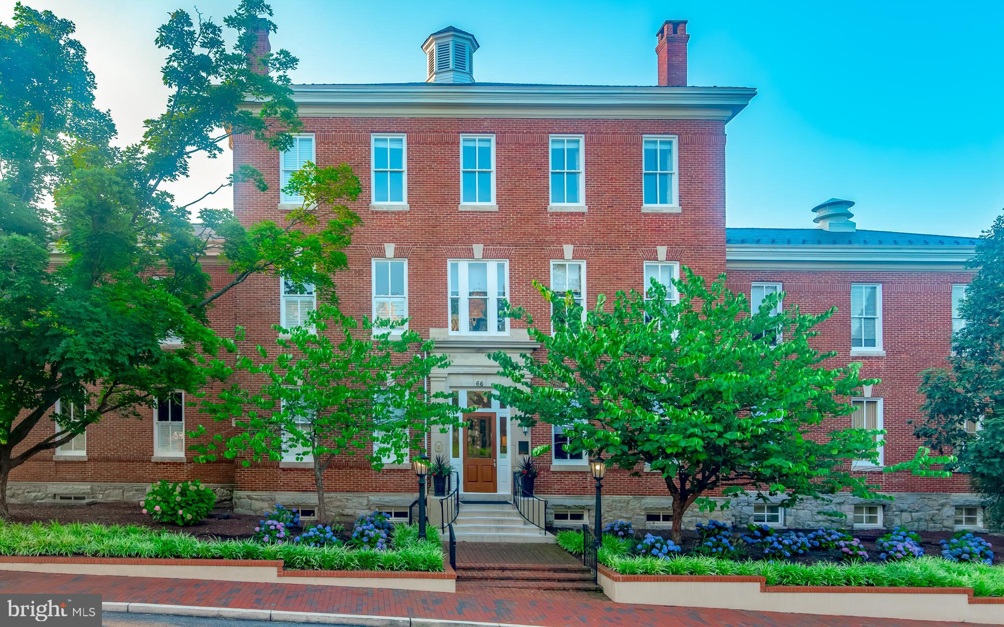 Rare penthouse opportunity in downtown Annapolis. This 3-bedroom, 3.5-bath condo in the exclusive Acton’s Landing community offers over 2,500 square feet of mint-condition living space, private elevator access, two deeded tandem garage parking spaces, and two large balconies with  skyline views of Annapolis.
The layout is bright, open and functional, with natural light throughout the day. The white kitchen features Silestone countertops, custom cabinetry and tile backsplash, gas cooking, a wine refrigerator, under-cabinet lighting, and new refrigerator and dishwasher.

Recent updates include a new HVAC system, new hardwood flooring, new wall-to-wall carpet in all three bedrooms, and a new dining room chandelier. The powder room and main-level en-suite bath have been updated. The combined laundry room and pantry offers custom built-ins, new flooring, a new washer and dryer, and two refrigerated beverage drawers. The entire unit has been freshly painted.

Residents at Acton’s Landing enjoy secure entry, on-site management, a fitness center, meeting and recreation rooms, a library, and a landscaped courtyard with a fountain.

Located just steps from Acton’s Cove Waterfront Park, boutique shops, restaurants, the United States Naval Academy, the Maryland State House, and the Maryland Governor’s Mansion, this is a well-appointed home in one of Annapolis’ most desirable locations. Don't miss this lock and leave opportunity!