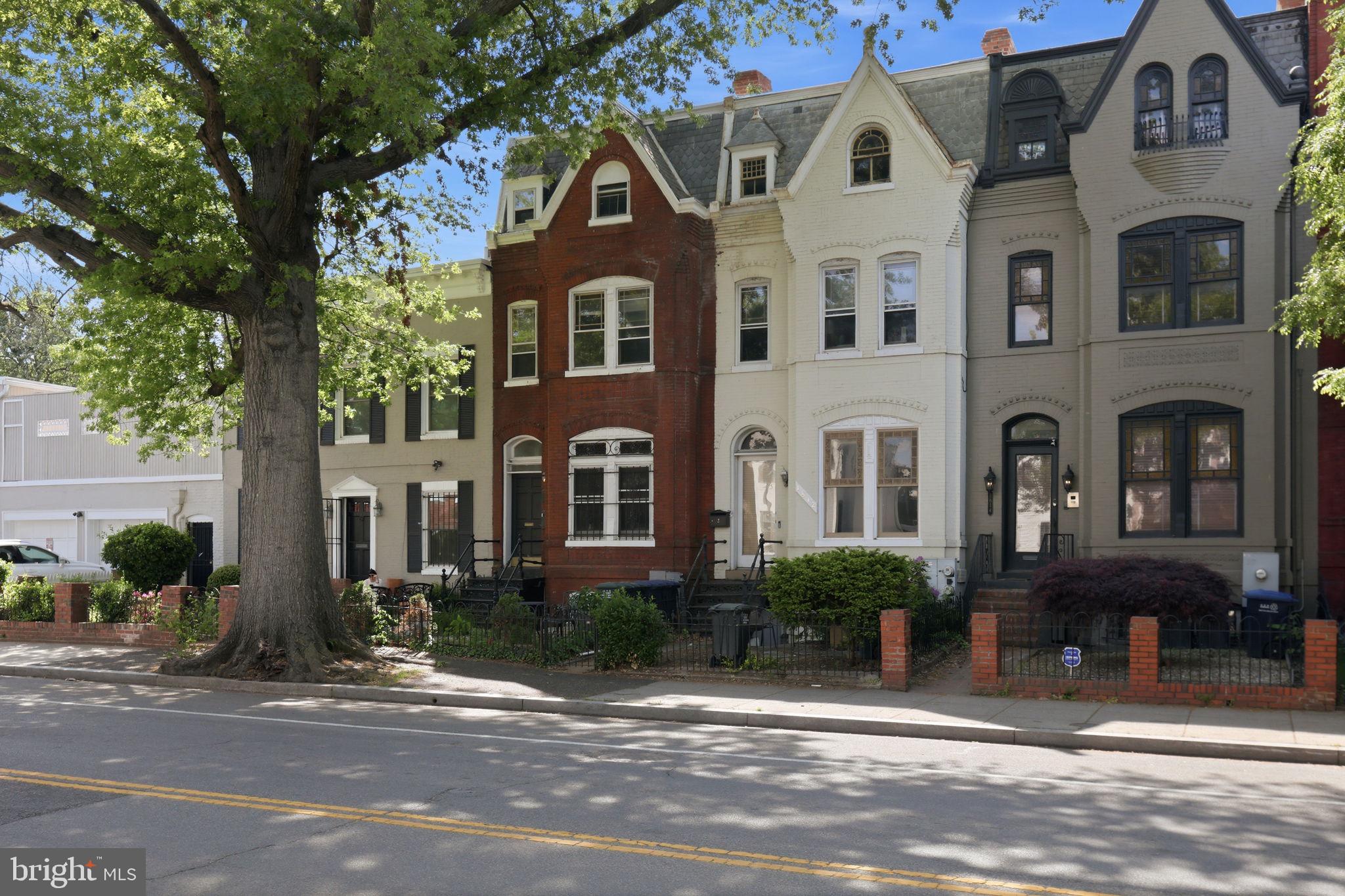 Exceptional 1906 historic Victorian rowhouse updated and renovated into two spacious bi-level 2 BR apartments. C of O for two units, separately metered and self-contained. The building contains 4  levels which includes a basement with storage space and laundry facilities. Large rooms with high ceilings can be found through most of the building along with wood floors, built-ins and skylights. Each apartment has 2 bedrooms and 1 1/2 baths, with light-filled living spaces. A deck and fenced yard are included with Apt #1. The second apartment is vacant and ideal for an owner who wants to live in the building plus have IMMEDIATE rental income from a rented unit (currently $3500 plus utilities.  Well-appointed, updated kitchens include generous cabinetry, quality appliances and ample work and eating spaces. Updated baths feature clean contemporary styles. Each apartment is separately metered and includes central heat and air conditioning. Two shared laundry machines and extra storage space can be found in the basement.
Located in popular, highly walkable, bike-friendly and pet-friendly neighborhood near Logan Circle and just 2 blocks from the U Street Metro. Walk to coffee shops, trendy retail, parks, restaurants and shopping conveniences. This property exudes warmth, energy, sophistication and convenience in a prime Northwest Washington DC neighborhood.