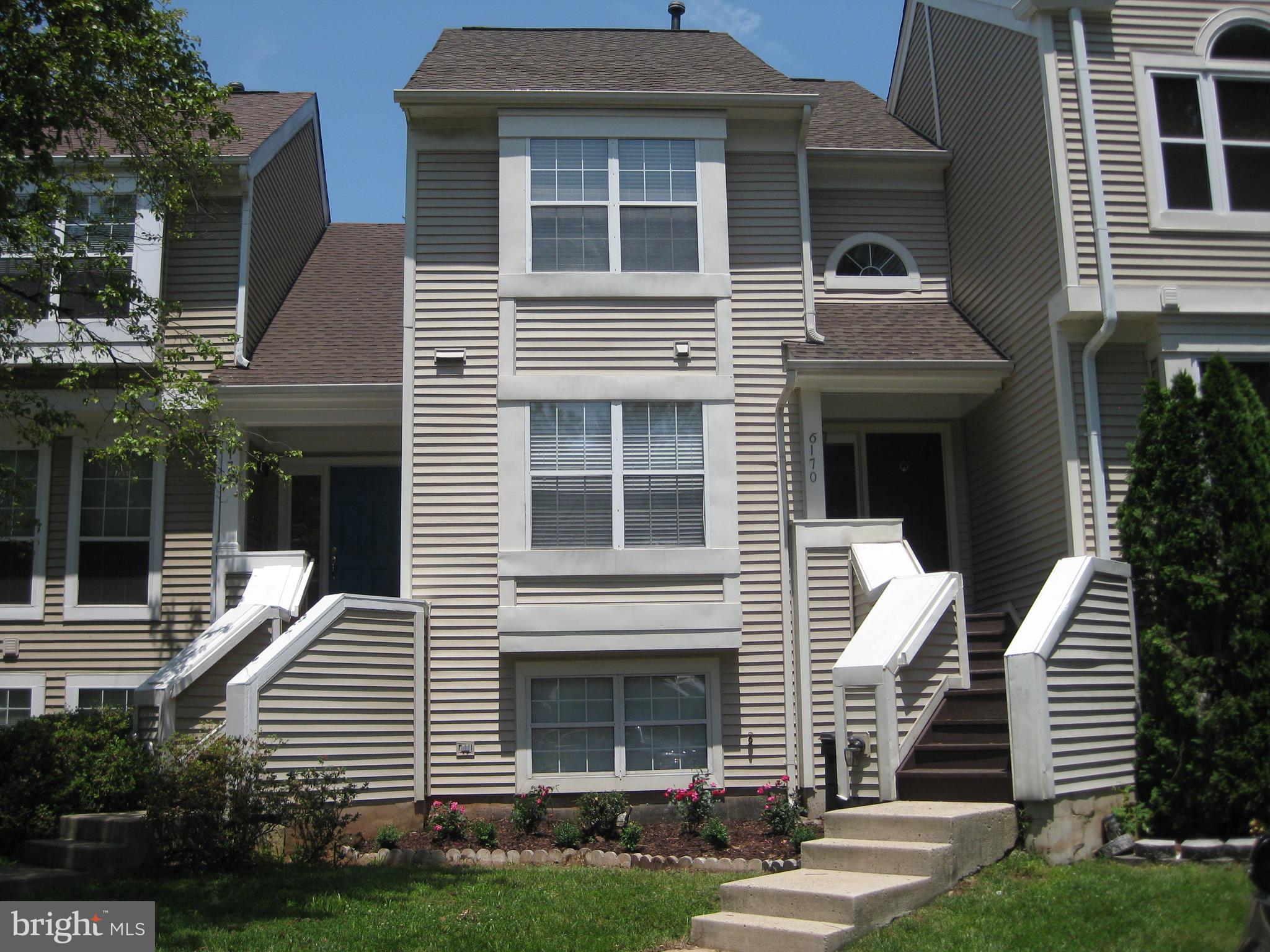 Large 4 bedroom 3.5 bath TH with Hardwood floors on main level, carpet in bedrooms and basement level,  fireplace,  deck and fully fenced rear yard, backs to trees and open common area.  Close to 66 and shopping.   Available immediately .