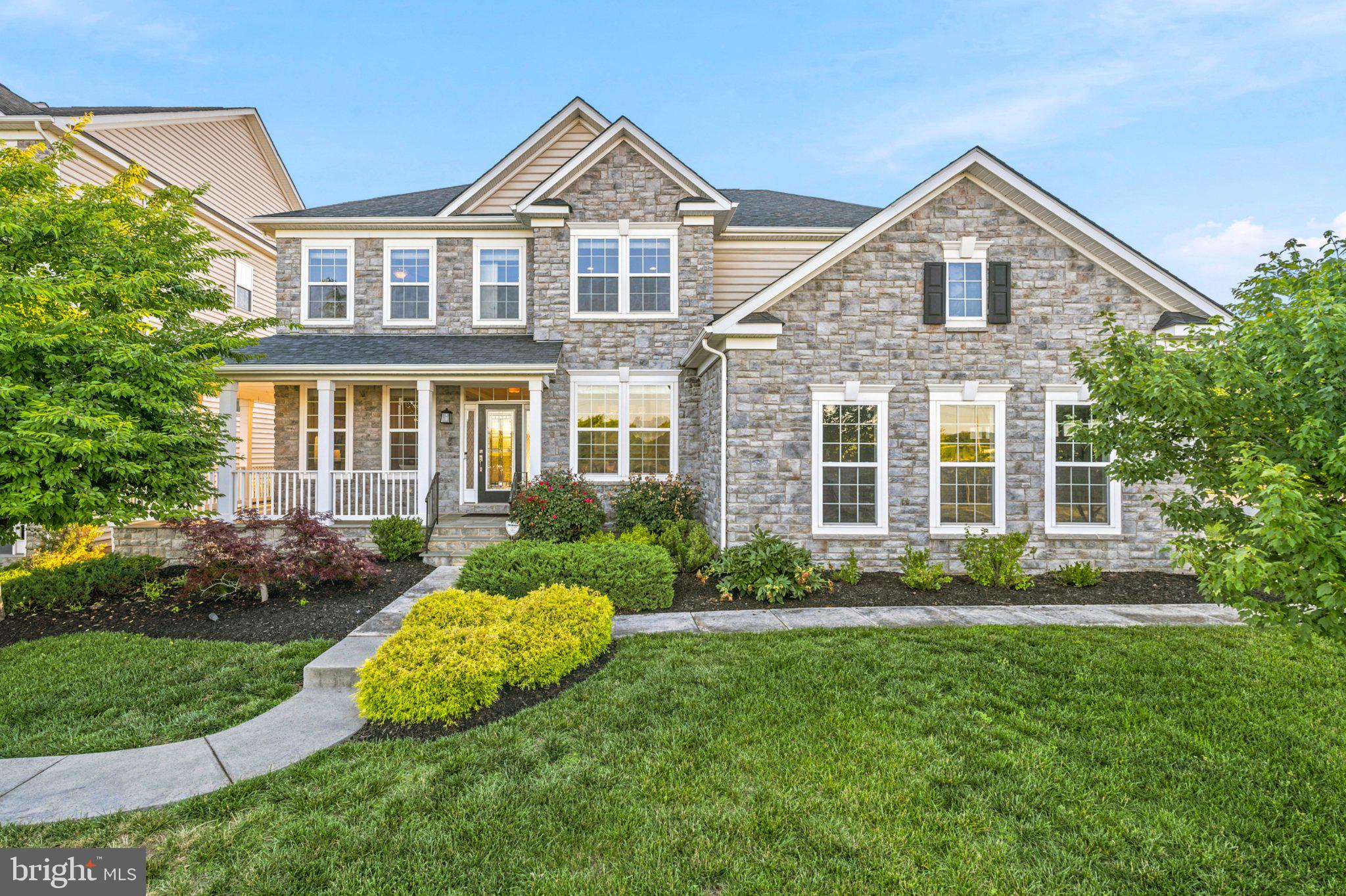 731 Holden Road is your gateway to the ultimate Frederick lifestyle. Stately streets, model landscaping, and a location that puts the best of Downtown Frederick just minutes from your front door. Carroll Creek, the restaurants, the farmers market, the energy of a city that consistently earns its place on every "best of" list — all of it, without sacrificing the calm you come home to.
As the original model home for the neighborhood's single-family detached collection, this Richmond American Homes-built residence was loaded with every available upgrade at the time — and it shows in the details. A wraparound porch made for slow mornings. A sunroom that captures the light. A side-load garage and additional off-street parking that make everyday living genuinely easy. Inside, nearly four thousand finished square feet unfold across three expansive levels. The primary suite has its own sitting room — a quiet retreat within a retreat. An upper-level guest room offers its own en-suite bath, giving visitors a space that feels like their own. The laundry room is carefully tucked away on the upper level, directly among the bedrooms. The main floor offers an oversized kitchen island, ambient lighting, tray ceilings, crown molding, and an office with ample custom shelving. The fully finished basement rounds it out with a fifth bedroom, full bath, and bar, while still having a massive storage and utility room.
This is a home that has been lived in and loved by its original owners — it’s turn-key and ready for its next chapter, with the bones and the address to support whatever that looks like for you.
Eastchurch. Three minutes to Downtown Frederick. The lifestyle is waiting for you.