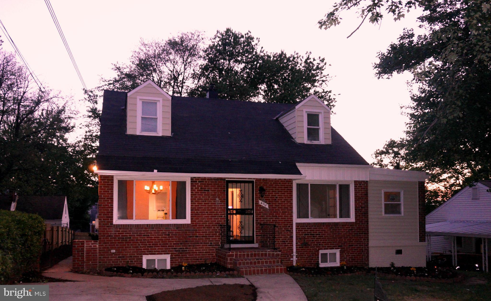 Fantastic renovation of this 3 bedroom 2 full bath single family detached home. Granite and Stainless steel in the kitchen. New baths. New paint and carpet. Beautiful hardwoods. Large bedrooms. A  beautifully paneled finished basement. HUGE back yard newly fully fenced. Seller will buy 1 year Home Warranty if buyer uses Seller's preferred Title Company. Come fall in love.