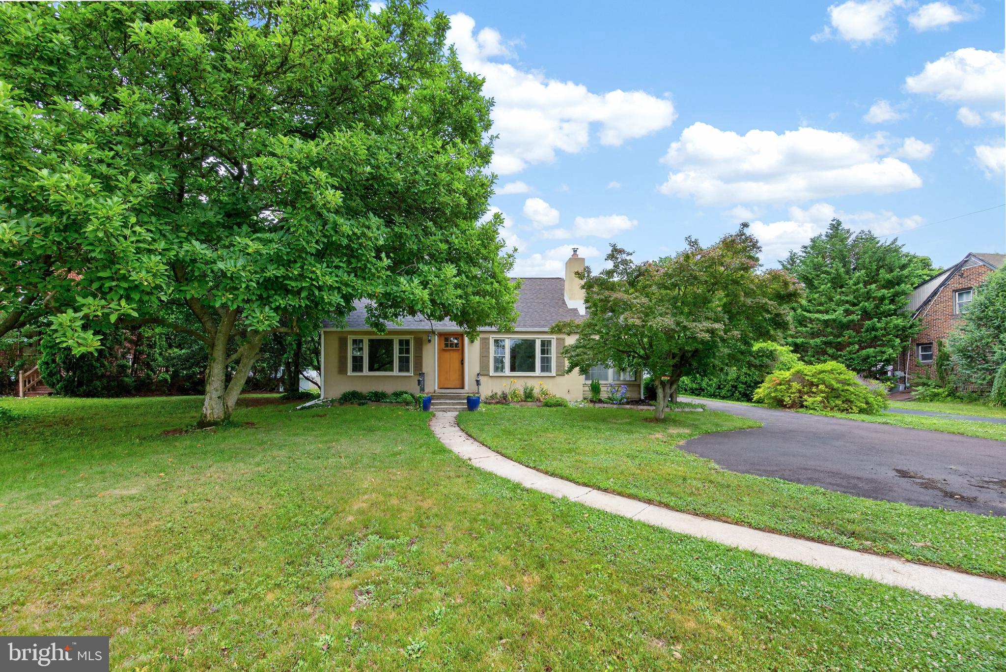 Set on a 0.55-acre lot in Upper Providence Township, this 3-bedroom, 2-full-bath home offers 1,807 square feet plus a spacious finished lower level. Hardwood floors carry through much of the main level, where the family room, dining room, kitchen, and three bedrooms create a practical layout with plenty of natural light. At 339 E Linfield Trappe Road, the third bedroom features an expansive wall of windows, exposed wood beams, skylights, and direct access to a full bath. The kitchen offers generous work & cabinet space & additional open shelving .  The remodeled hall bathroom, completed in 2025, adds a double vanity, subway tile tub surround and updated black fixtures. Downstairs, the finished basement renovated in 2021 provides a large flexible living area with recessed lighting, durable flooring and a wood bar perfect for entertaining all your guests.  There is also a separate unfinished utility and laundry space completing this level. Outside, the fenced rear yard opens to a wide lawn, storage shed, and a large 2025 paver patio with a built-in fire pit, creating an impressive outdoor extension of the home.  A detached two-car garage and driveway add parking and storage, while major improvements include a raised septic system in 2019, fencing in 2020, water softener and filtration system in 2022 and the roof, doors and gutters were replaced in 2024.  You get all this plus you are centrally located just down the street from Spring Valley YMCA, Target & GIANT.  This fantastic location put you in close proximity to all of the shopping & dining options that this area provides.  Located in the sought after Spring-Ford School District and close to all major roads connections are all nearby adds convenience to this amazing Upper Providence Township location.  Do you enjoy golfing?  Numerous public golf courses and the areas best private country club, Spring Ford Country Club are just minutes away.  Don't hesitate, come and check this one out before it is too late.