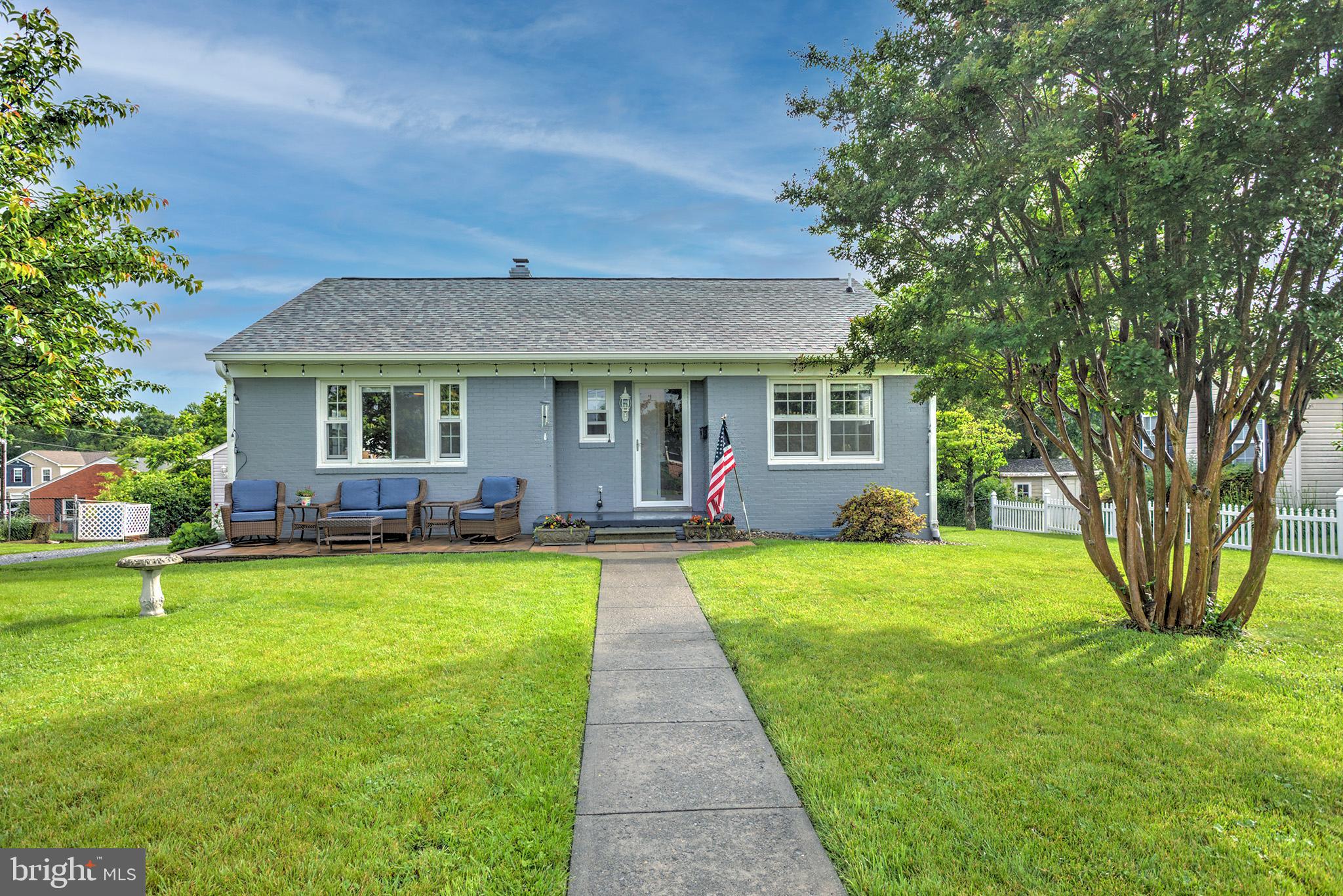 Price improvement!  Welcome to this cozy, updated 3-bedroom, 2-bath ranch-style home, combining both comfort and style. Featuring a modern stained brick exterior, this move-in ready gem provides the perfect place for the first time home buyer, young professionals or retirees looking to downsize . The third bedroom has been repurposed as a dining area, but can easily be converted back.   You'll be able to enjoy the outdoors on the patio or on the covered Trex deck—perfect for relaxing or hosting gatherings. The detached  2-car garage adds convenience and extra storage. Located in a quiet, established neighborhood, close to town and commuting routes, this home is a must-see!