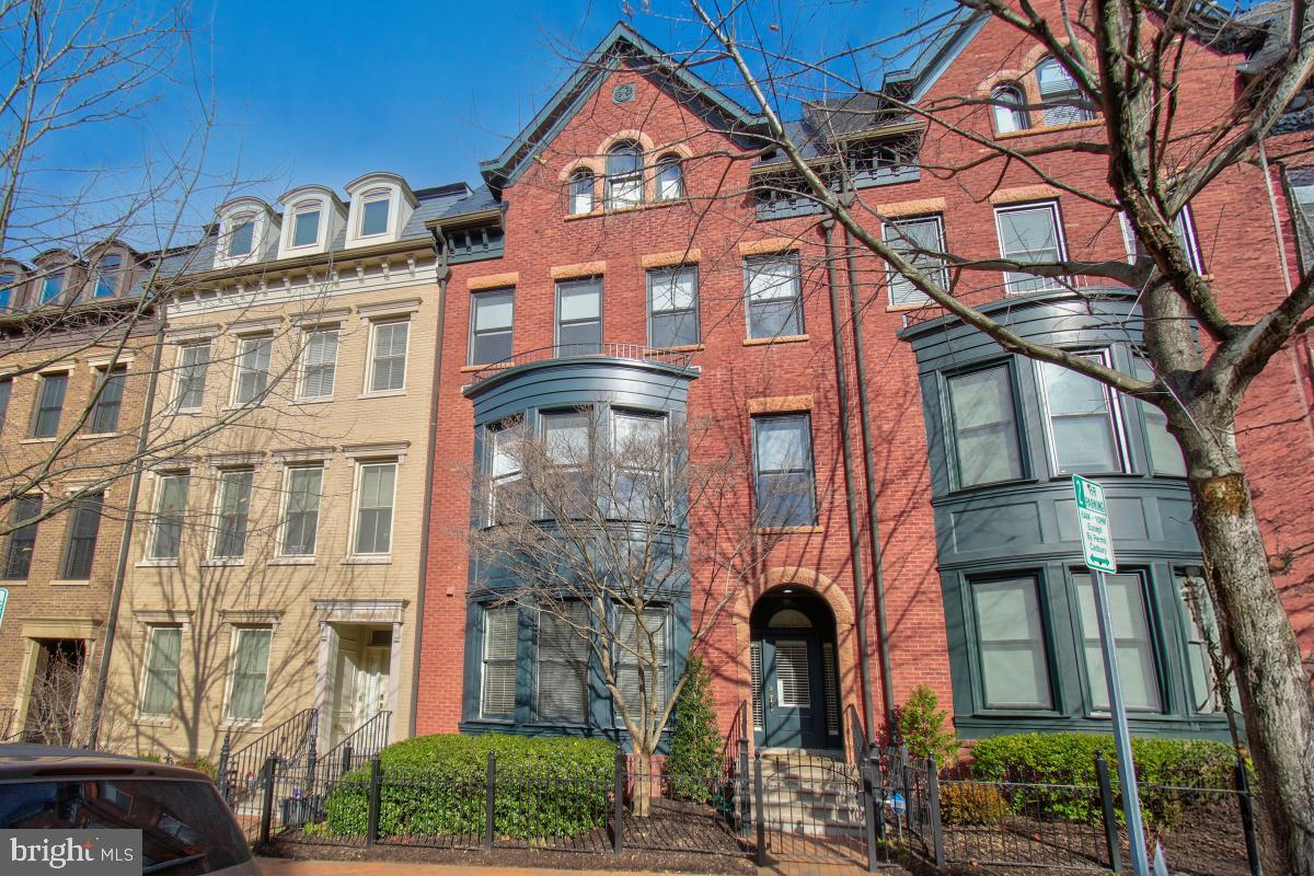 Location, Location Location! Known as Bethesda Magazine’s Readers Best Luxury Townhome Community, this Berkeley Model 4-level townhome is less than a block from the shops, stores, restaurants, pool and clubhouse of this splendid community. With more than 4,300 square feet of gracious living space on four levels, this elegant brick brownstone showcases gleaming hardwoods, crown moldings, iron newels, wainscoting, recessed lighting, four gas fireplaces and a paneled ELEVATOR to all four levels. Natural light streams through the walls of windows on every level highlighting two large home offices, one with a gas fireplace, media/exercise room, four large bedrooms, three full baths and two half baths, large entertaining formal living and dining areas, family room opening to gourmet chef's kitchen with a six burner Viking gas range, two large entertaining decks including an extra-spacious roof deck with a dual sided gas fireplace and an oversized two car garage. This pristine home—in turnkey condition—features high-end finishes and fixtures throughout. Meticulously maintained and upgraded in the past year, the current owners have redone the 2 decks, installed a new roof, added family room built-ins, replaced the high-end refrigerator and installed new window treatments, screens and a carpet runner on the stairs. Park Potomac residents enjoy individual yard maintenance, snow removal to the front door and the rear of each garage, pool with lifeguard, club house with exercise and entertaining facilities, tot lot, dog park, walking trails, and free shuttle to the White Flint Metro during the week. Perfectly located, major transportation routes are nearby making commuting a breeze. An easy and sophisticate lifestyle begins here. Don’t miss this great opportunity.